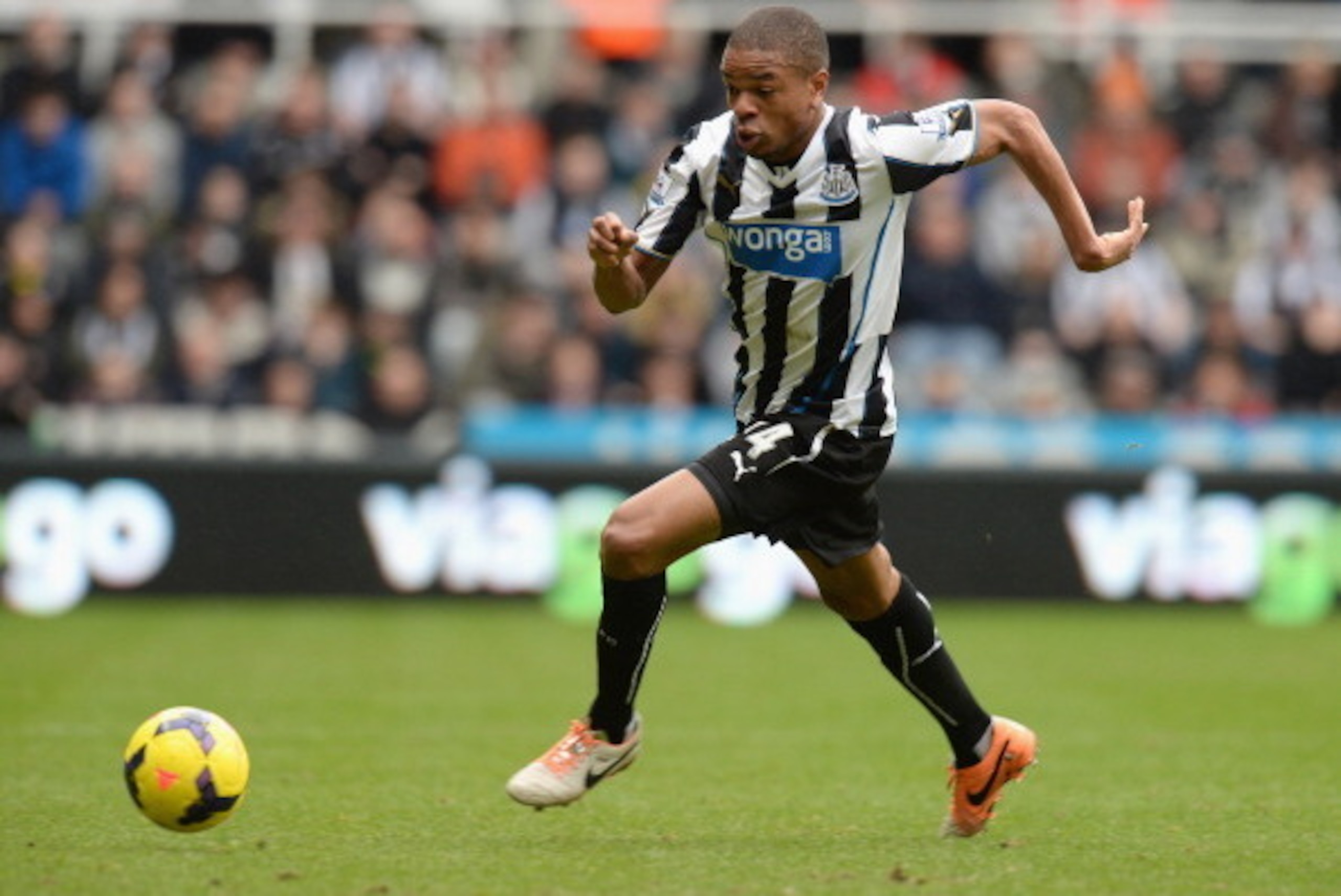 NEWCASTLE UPON TYNE, ENGLAND - FEBRUARY 23:  Loic Remy of Newcastle United runs with the ball during the Barclays Premier League match between Newcastle United and Aston Villa at St James' Park on February 23, 2014 in Newcastle upon Tyne, England.  (Photo