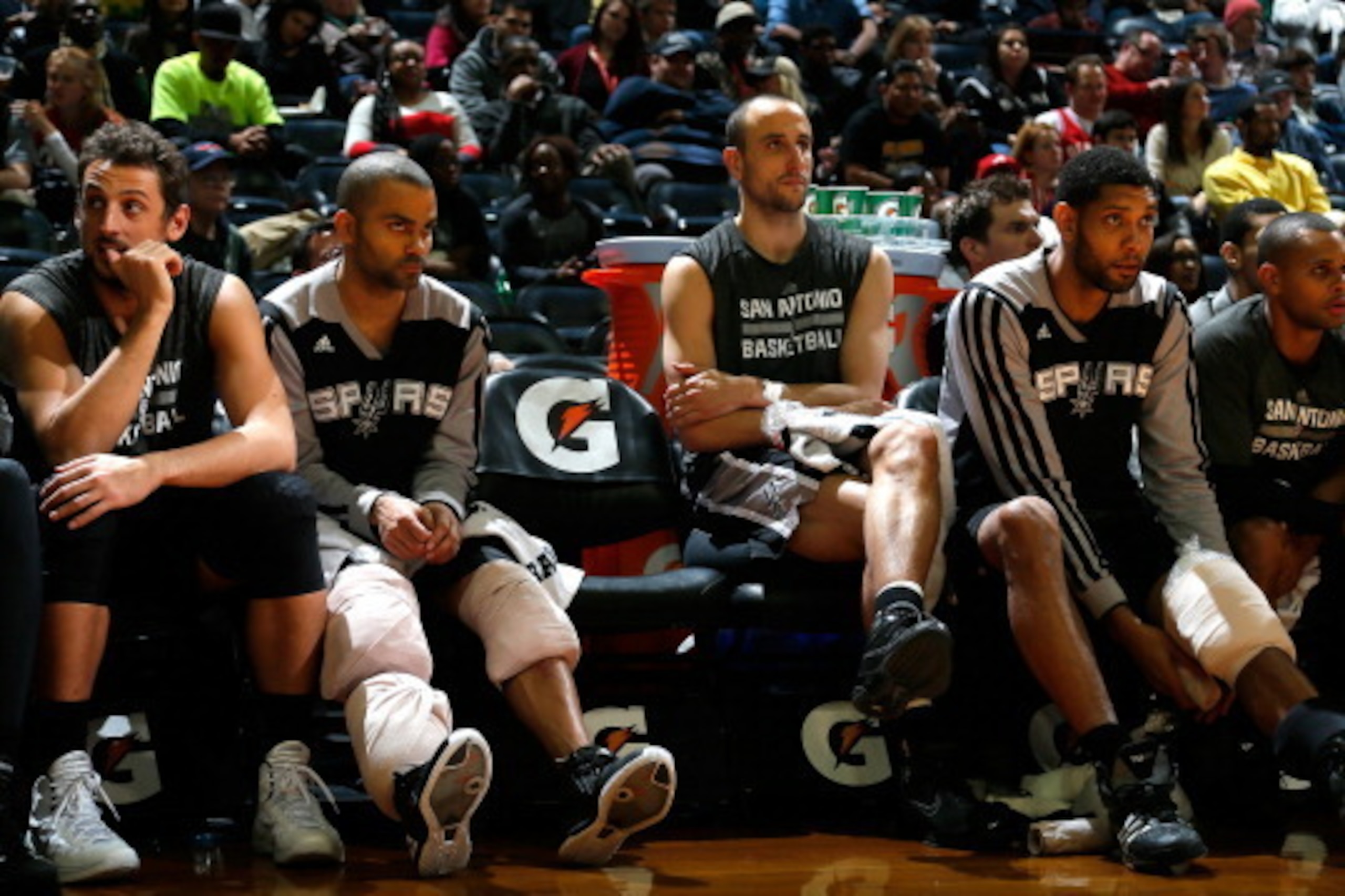 ATLANTA, GA - JANUARY 24: Marco Belinelli #3, Tony Parker #9, Manu Ginobili #20, Tim Duncan #21 and Patty Mills #8 of the San Antonio Spurs sit on the bench in the final minutes of their 105-79 win over the Atlanta Hawks at Philips Arena on January 24, 2 ATLANTA, GA - JANUARY 24: Marco Belinelli #3, Tony Parker #9, Manu Ginobili #20, Tim Duncan #21 and Patty Mills #8 of the San Antonio Spurs sit on the bench in the final minutes of their 105-79 win over the Atlanta Hawks at Philips Arena on January 24, 2
