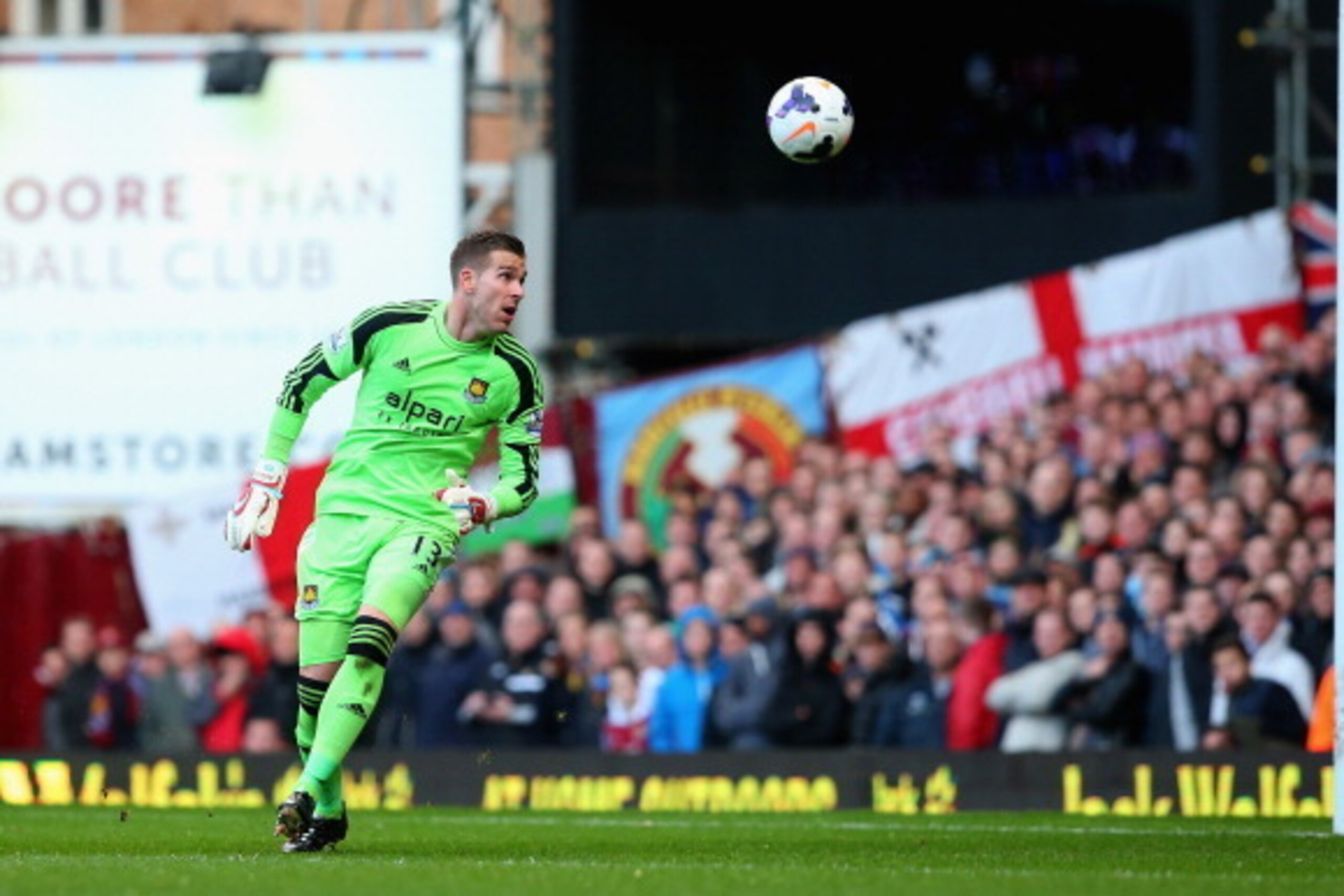 LONDON, ENGLAND - MARCH 22:  Goalkeeper Adrian of West Ham looks on in vain as the long range shot from Wayne Rooney of Manchester United opens the scoring during the Barclays Premier League match between West Ham United and Manchester United at Boleyn Gr