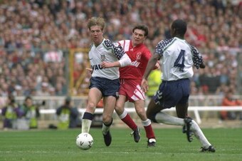 1992:  Ray Houghton (centre) of Liverpool chases Anton Rogan (left) of Sunderland as team mate Gary Bennett (right) moves in during the FA Cup final at Wembley Stadium in London. Liverpool won the match 2-0. \ Mandatory Credit: Shaun  Botterill/Allsport