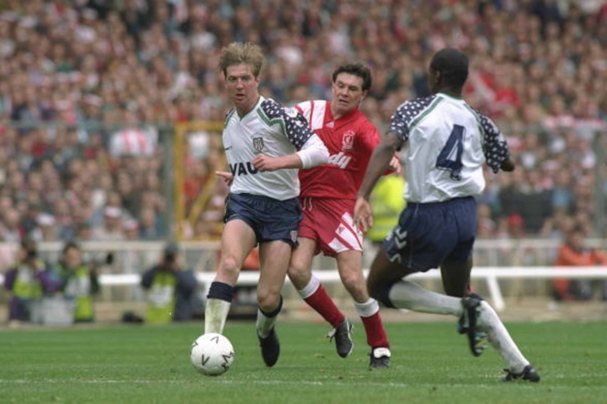 1992:  Ray Houghton (centre) of Liverpool chases Anton Rogan (left) of Sunderland as team mate Gary Bennett (right) moves in during the FA Cup final at Wembley Stadium in London. Liverpool won the match 2-0. \ Mandatory Credit: Shaun  Botterill/Allsport