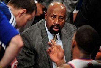 Mar 31, 2013; New York, NY, USA; New York Knicks head coach Mike Woodson talks to his team during the second half against the Boston Celtics at Madison Square Garden. The Knicks won the game 108-89. Mandatory Credit: Joe Camporeale-USA TODAY Sports