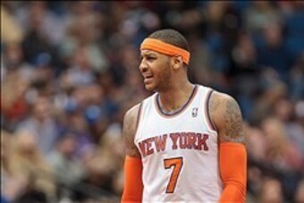 Mar 5, 2014; Minneapolis, MN, USA; New York Knicks forward Carmelo Anthony (7) in the third quarter against the Minnesota Timberwolves at Target Center. The Knicks win 118-106. Mandatory Credit: Brad Rempel-USA TODAY Sports