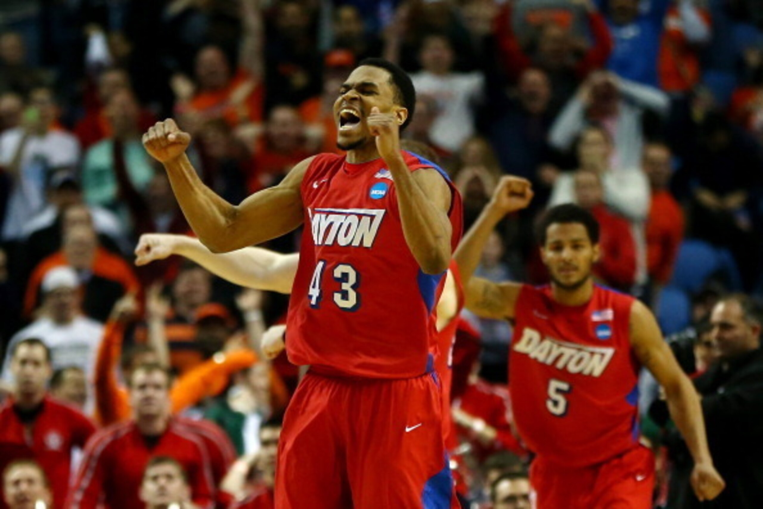 BUFFALO, NY - MARCH 20: Vee Sanford #43 of the Dayton Flyers reacts after defeating the Ohio State Buckeyes 60-59 in the second round of the 2014 NCAA Men's Basketball Tournament at the First Niagara Center on March 20, 2014 in Buffalo, New York.  (Photo 