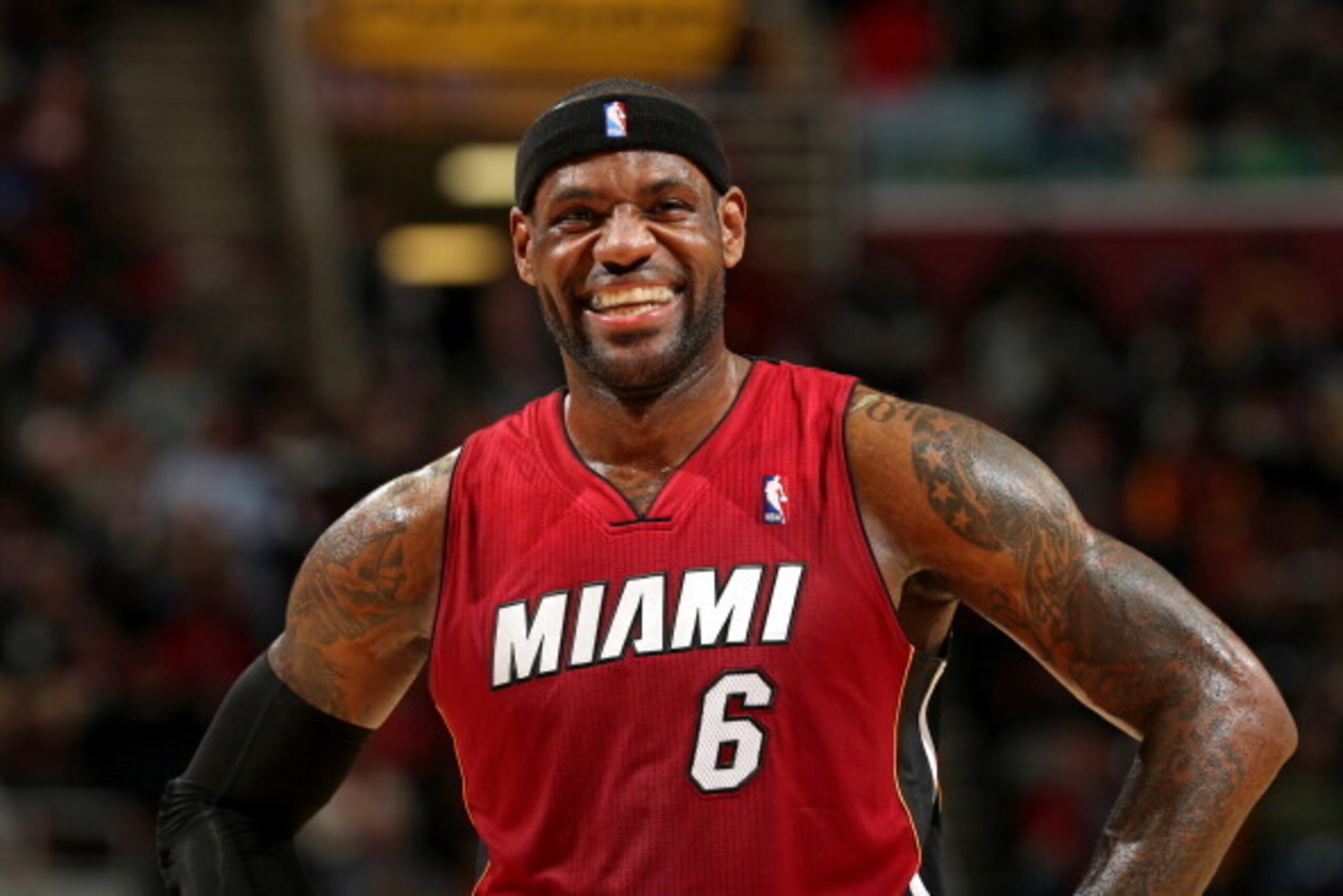 CLEVELAND, OH - MARCH 18:  LeBron James #6 of the Miami Heat smiles during the game against the Cleveland Cavaliers at The Quicken Loans Arena on March 18, 2014 in Cleveland, Ohio. NOTE TO USER: User expressly acknowledges and agrees that, by downloading 