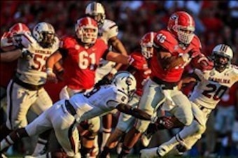 Sep 7, 2013; Athens, GA, USA; Georgia Bulldogs fullback Quayvon Hicks (48) runs the ball in the second half against the South Carolina Gamecocks at Sanford Stadium. Georgia won 41-30. Mandatory Credit: Daniel Shirey-USA TODAY Sports