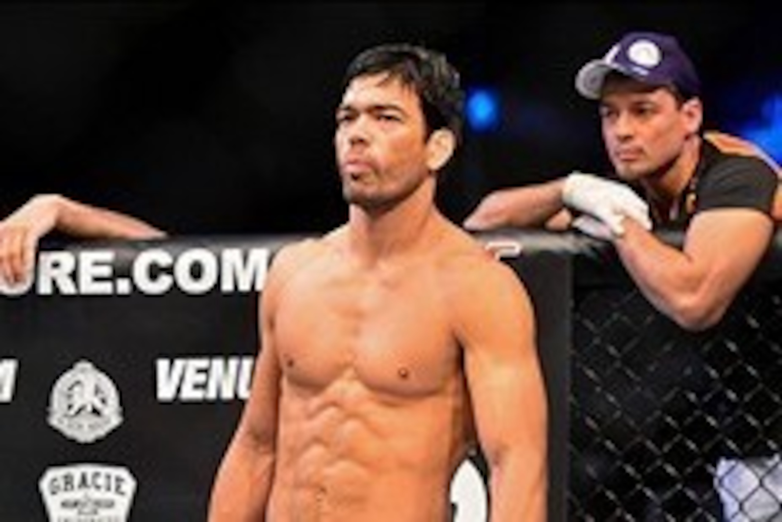 Feb 15, 2014; Jaragua do Sul, SC, Brazil; Lyoto Machida (red gloves) before his fight against Gegard Mousasi (blue gloves) during UFC Fight Night Machida vs Mousasi at Arena Jaragua. Mandatory Credit: Jason Silva-USA TODAY Sports