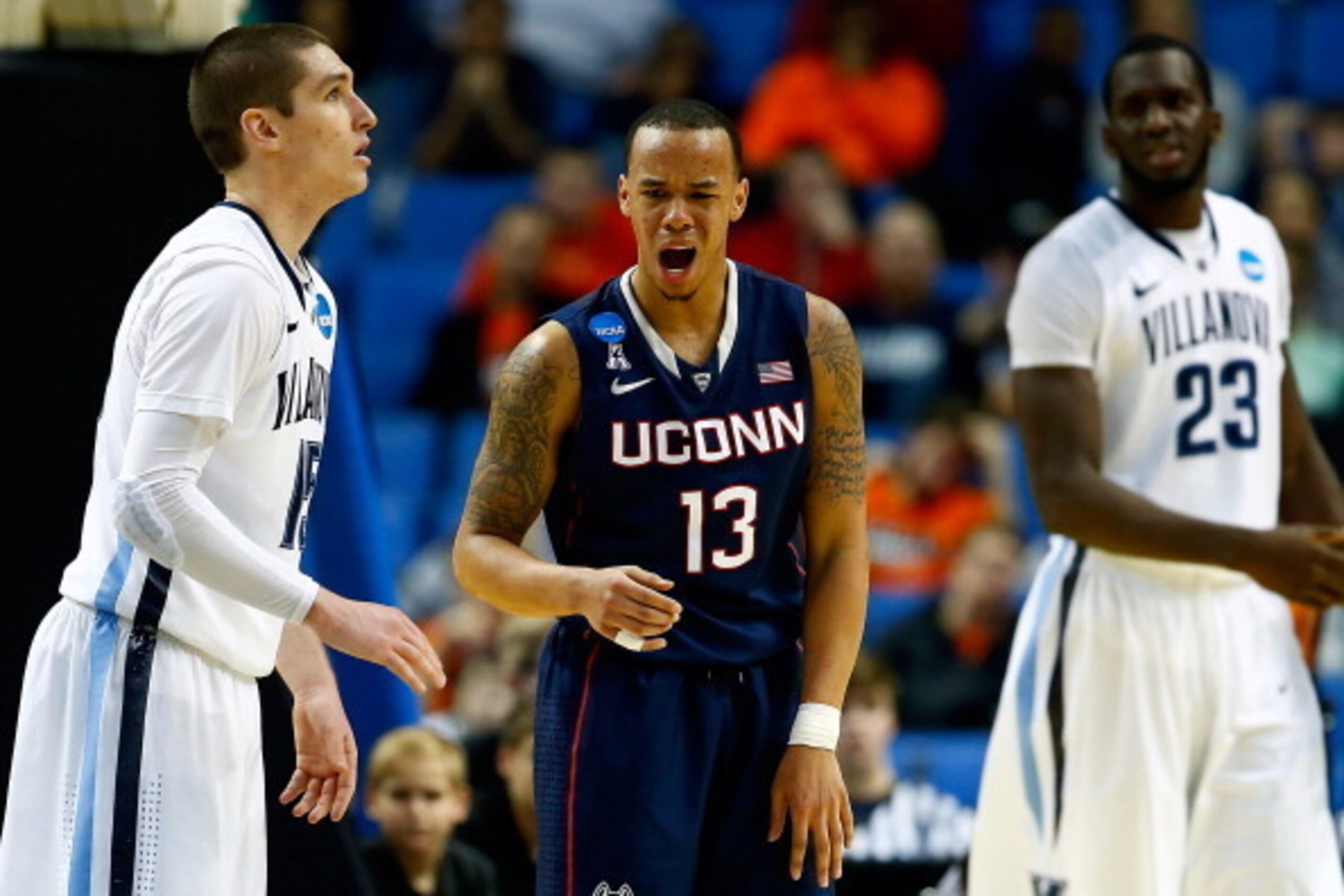 BUFFALO, NY - MARCH 22:  Shabazz Napier #13 of the Connecticut Huskies reacts against the Villanova Wildcats during the third round of the 2014 NCAA Men's Basketball Tournament at the First Niagara Center on March 22, 2014 in Buffalo, New York.  (Photo by