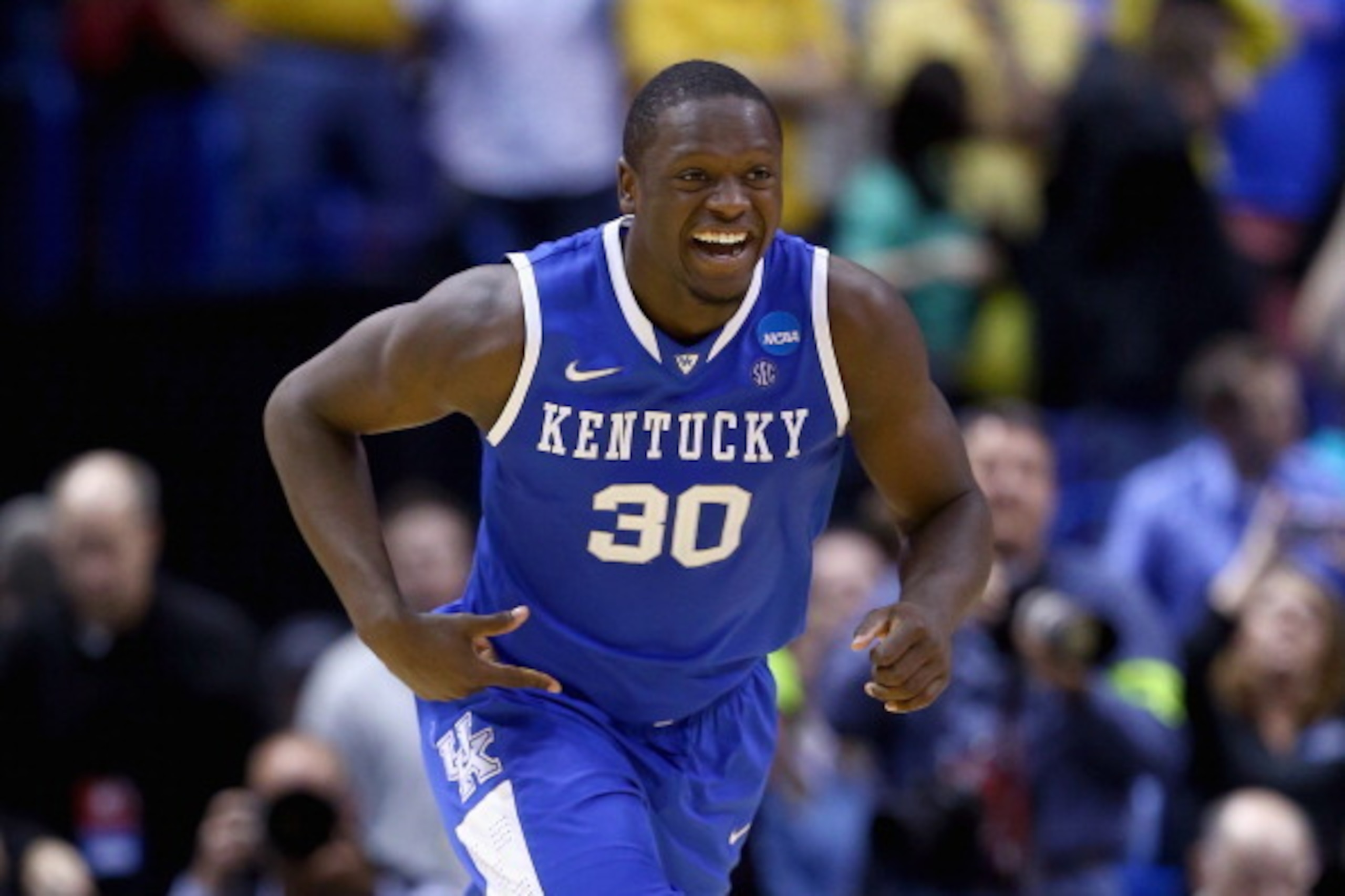 ST LOUIS, MO - MARCH 23:  Julius Randle #30 of the Kentucky Wildcats celebrates after defeating the Wichita State Shockers 78 to 76 during the third round of the 2014 NCAA Men's Basketball Tournament at Scottrade Center on March 23, 2014 in St Louis, Miss