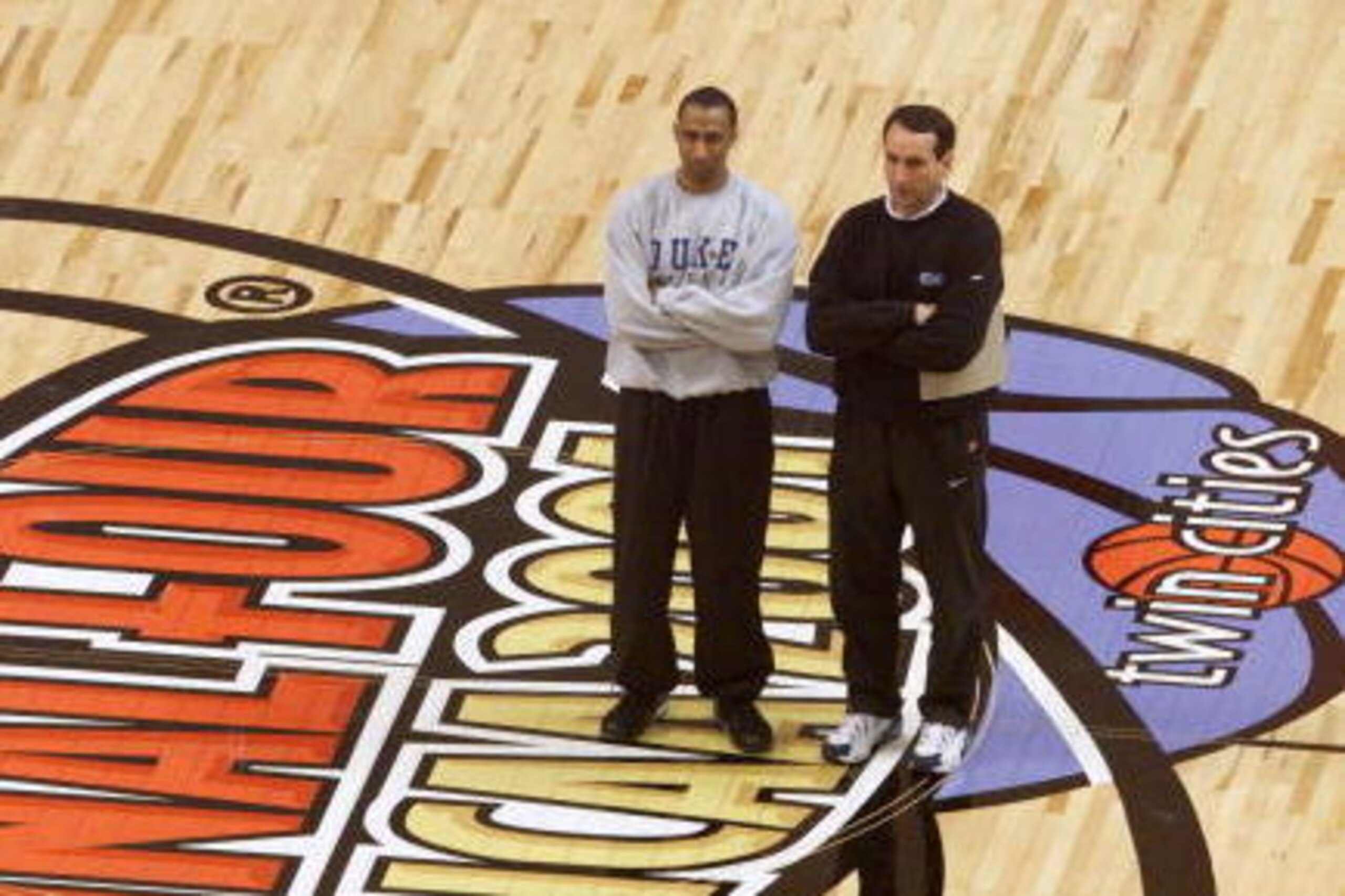 30 Mar 2001: Head coach Mike Krzyzewski, right, of Duke and his assistant coach Johnny Dawkins watch over their team's practice for the semifinal of the NCAA Men's Basketball Final Four tournament at the Metrodome in Minneapolis, Minnesota. DIGITAL IMAG 30 Mar 2001: Head coach Mike Krzyzewski, right, of Duke and his assistant coach Johnny Dawkins watch over their team's practice for the semifinal of the NCAA Men's Basketball Final Four tournament at the Metrodome in Minneapolis, Minnesota. DIGITAL IMAG