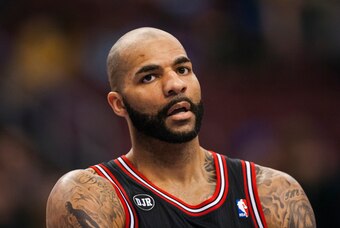 Mar 19, 2014; Philadelphia, PA, USA; Chicago Bulls forward Carlos Boozer (5) during the first quarter against the Philadelphia 76ers at the Wells Fargo Center. The Bulls defeated the Sixers 102-94. Mandatory Credit: Howard Smith-USA TODAY Sports