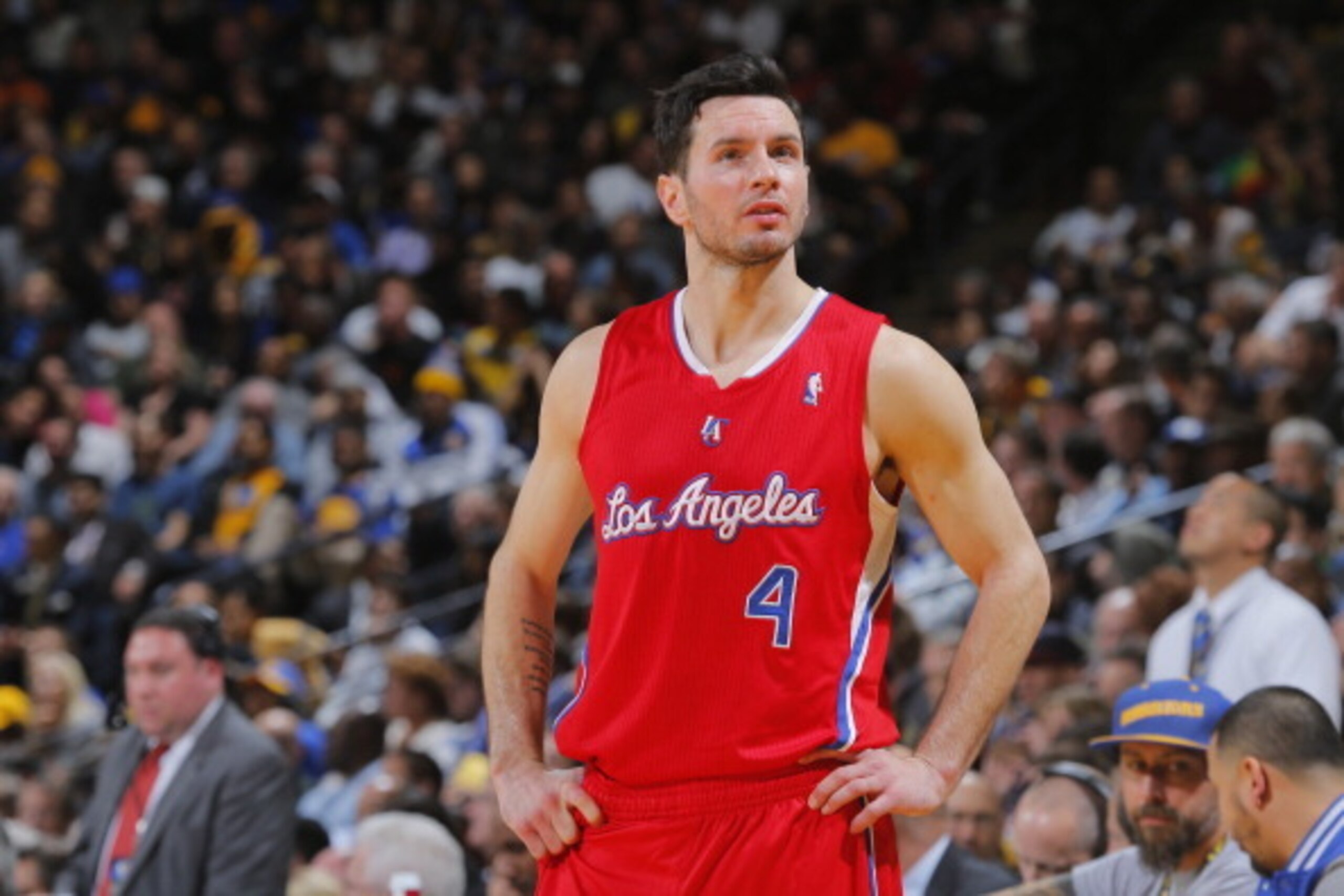 OAKLAND, CA - JANUARY 30: J.J. Redick #4 of the Los Angeles Clippers during a game against the Golden State Warriors on January 30, 2014 at Oracle Arena in Oakland, California. NOTE TO USER: User expressly acknowledges and agrees that, by downloading and 