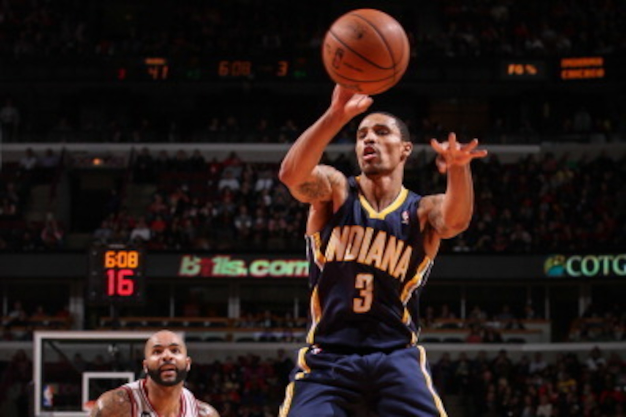 CHICAGO, IL - MARCH 24: George Hill #3 of the Indiana Pacers passes the ball against the Chicago Bulls on March 24, 2014 at the United Center in Chicago, Illinois. NOTE TO USER: User expressly acknowledges and agrees that, by downloading and or using this