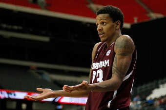 ATLANTA, GA - MARCH 13:  Jamal Jones #23 of the Texas A&M Aggies reacts against Missouri Tigers during the second round of the SEC Men's Basketball Tournament at Georgia Dome on March 13, 2014 in Atlanta, Georgia.  (Photo by Kevin C. Cox/Getty Images)