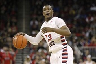 Mar 1, 2014; Fresno, CA, USA; Fresno State Bulldogs guard Marvelle Harris (23) dribbles the ball against the San Diego State Aztecs in the second half at the Save Mart Center at Fresno State. The Aztecs defeated the Bulldogs 82-67. Mandatory Credit: Cary 