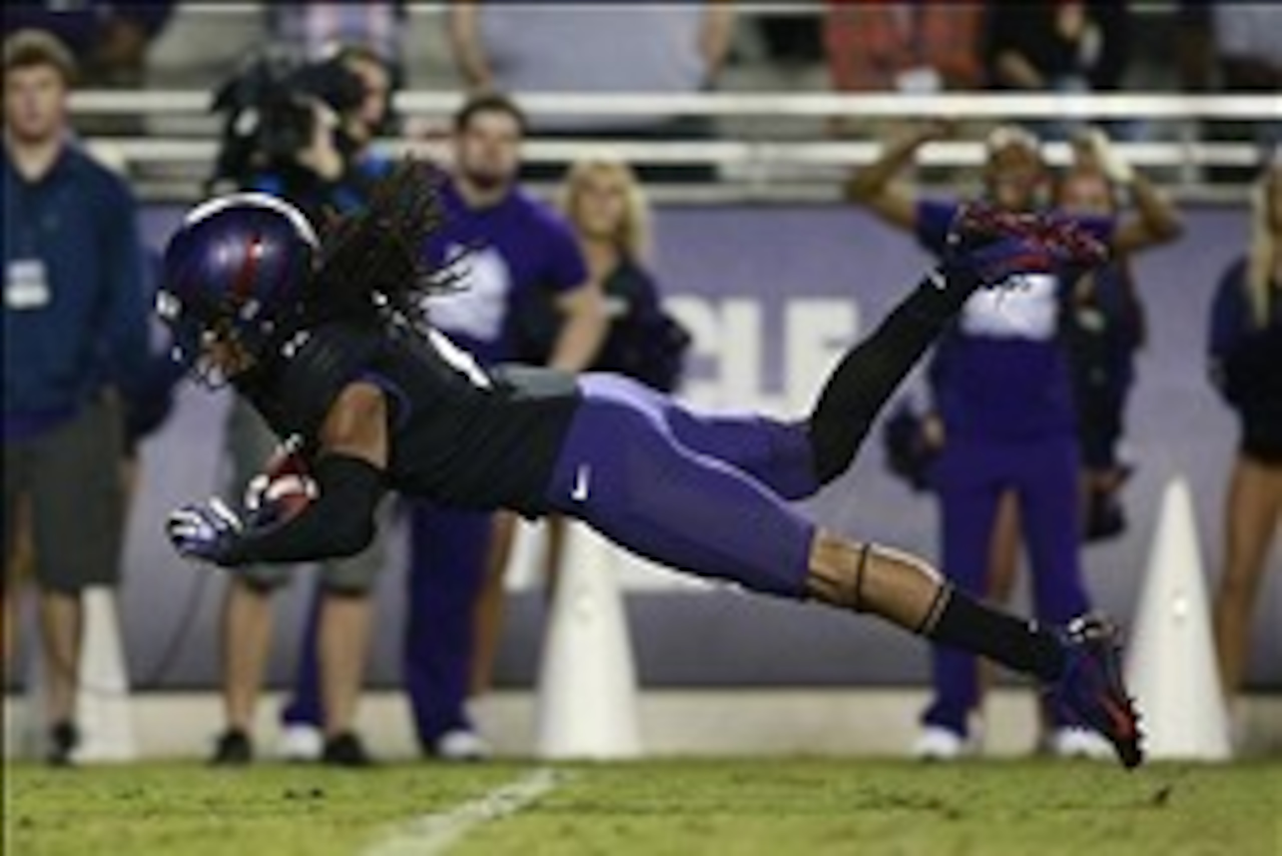 Oct 26, 2013; Fort Worth, TX, USA; TCU Horned Frogs cornerback Jason Verrett (2) intercepts a pass in the third quarter of the game against the Texas Longhorns at Amon G. Carter Stadium. Mandatory Credit: Tim Heitman-USA TODAY Sports