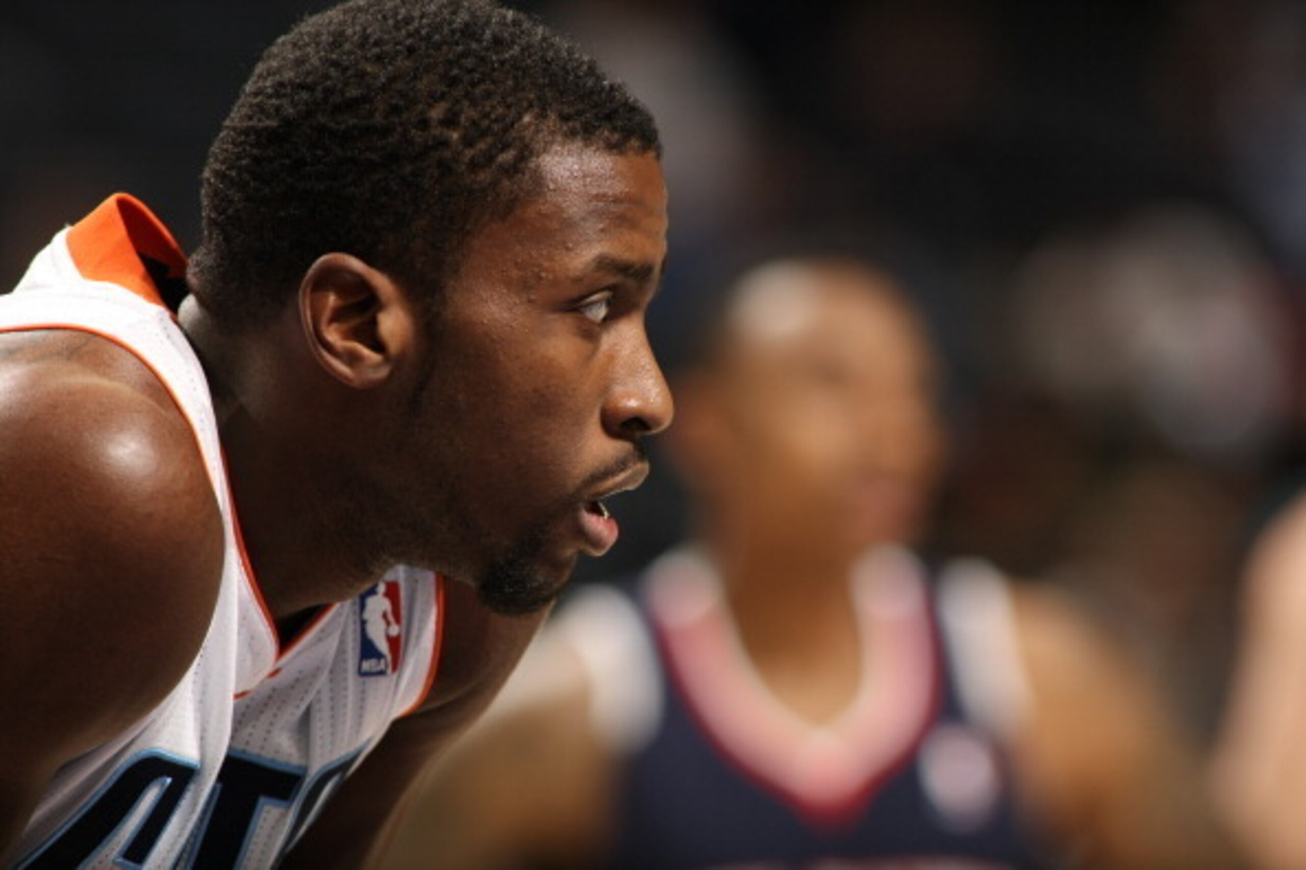 CHARLOTTE, NC - MARCH 17: Michael Kidd-Gilchrist #14 of the Charlotte Bobcats looks on during the game against the Atlanta Hawks at the Time Warner Cable Arena on March 17, 2014 in Charlotte, North Carolina. NOTE TO USER: User expressly acknowledges and a CHARLOTTE, NC - MARCH 17: Michael Kidd-Gilchrist #14 of the Charlotte Bobcats looks on during the game against the Atlanta Hawks at the Time Warner Cable Arena on March 17, 2014 in Charlotte, North Carolina. NOTE TO USER: User expressly acknowledges and a