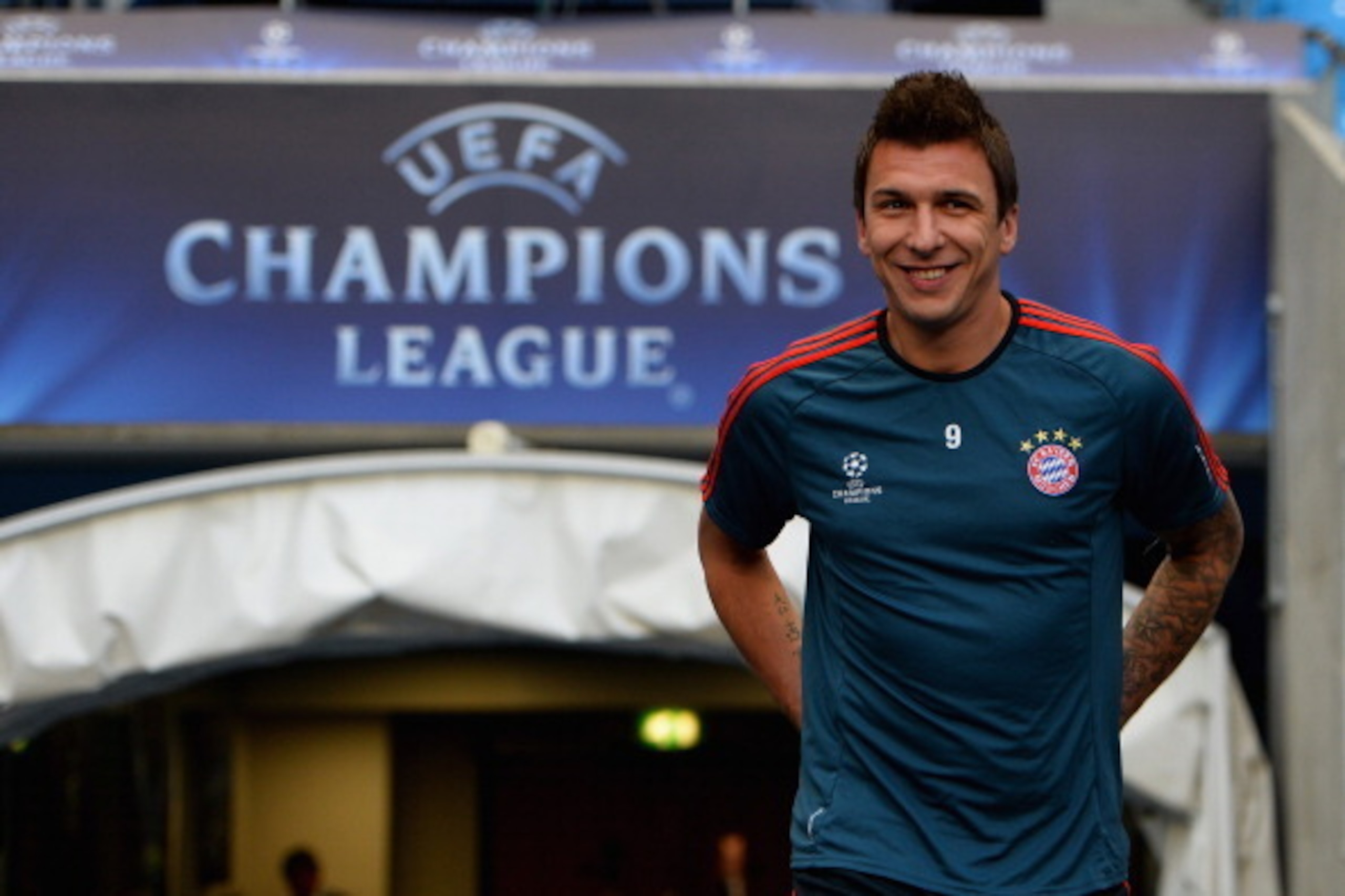 MANCHESTER, ENGLAND - OCTOBER 01: Mario Mandzukic of FC Bayern Muenchen walks out of the tunnel during a training session at Etihad Stadium on October 1, 2013 in Manchester, England.  (Photo by Laurence Griffiths/Getty Images)