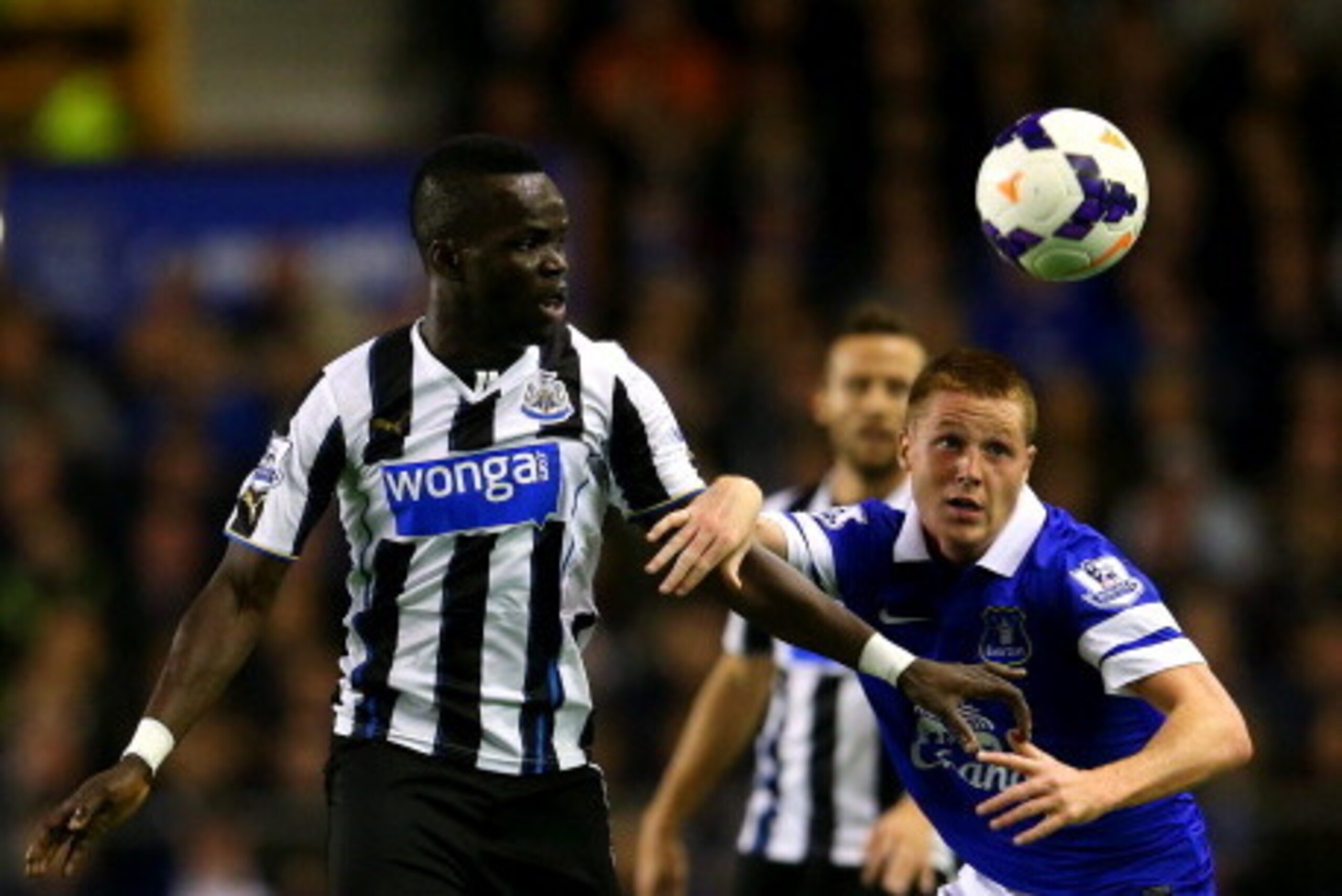 LIVERPOOL, ENGLAND - SEPTEMBER 30:  James McCarthy of Everton in action against Cheick Tiote of Newcastle during the Barclays Premier League match between Everton and Newcastle United at Goodison Park on September 30, 2013 in Liverpool, England.  (Photo b