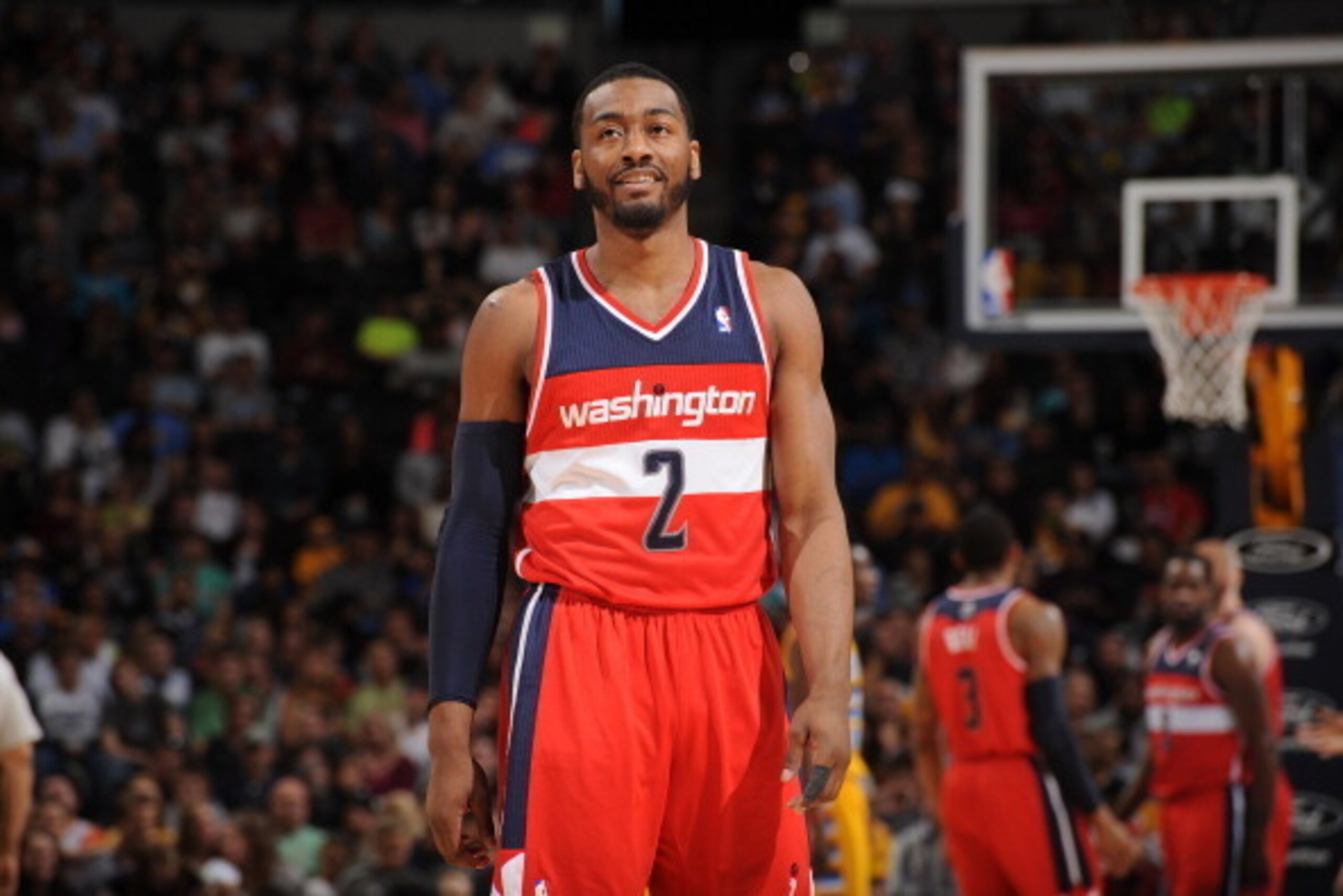 DENVER, CO - MARCH 23: John Wall #2 of the Washington Wizards stands on the court during a game against the Denver Nuggets on March 23, 2014 at the Pepsi Center in Denver, Colorado. NOTE TO USER: User expressly acknowledges and agrees that, by downloading DENVER, CO - MARCH 23: John Wall #2 of the Washington Wizards stands on the court during a game against the Denver Nuggets on March 23, 2014 at the Pepsi Center in Denver, Colorado. NOTE TO USER: User expressly acknowledges and agrees that, by downloading