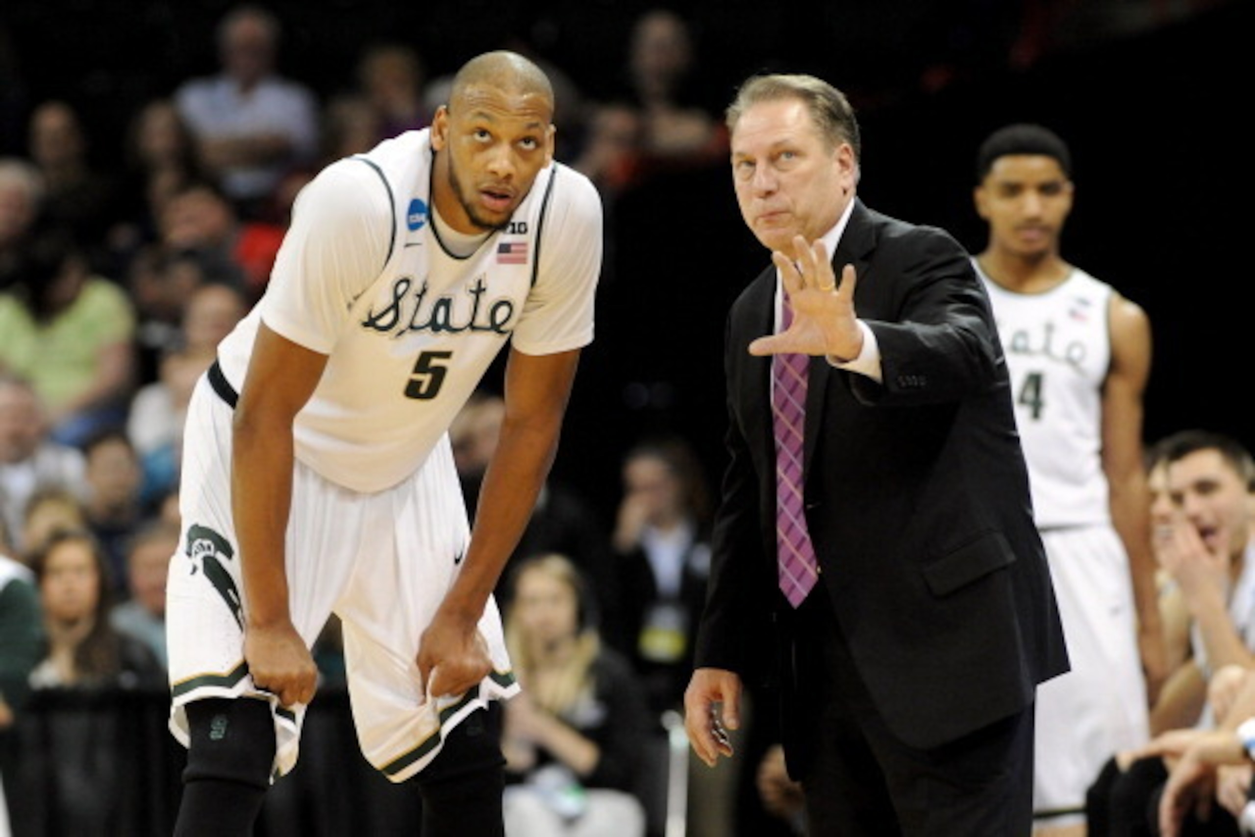 SPOKANE, WA - MARCH 20:  Michigan State Spartans head coach Tom Izzo  talks to Adreian Payne #5 during their game against the Delaware Fightin Blue Hens in the second round of the 2014 NCAA Men's Basketball Tournament at Spokane Veterans Memorial Arena on