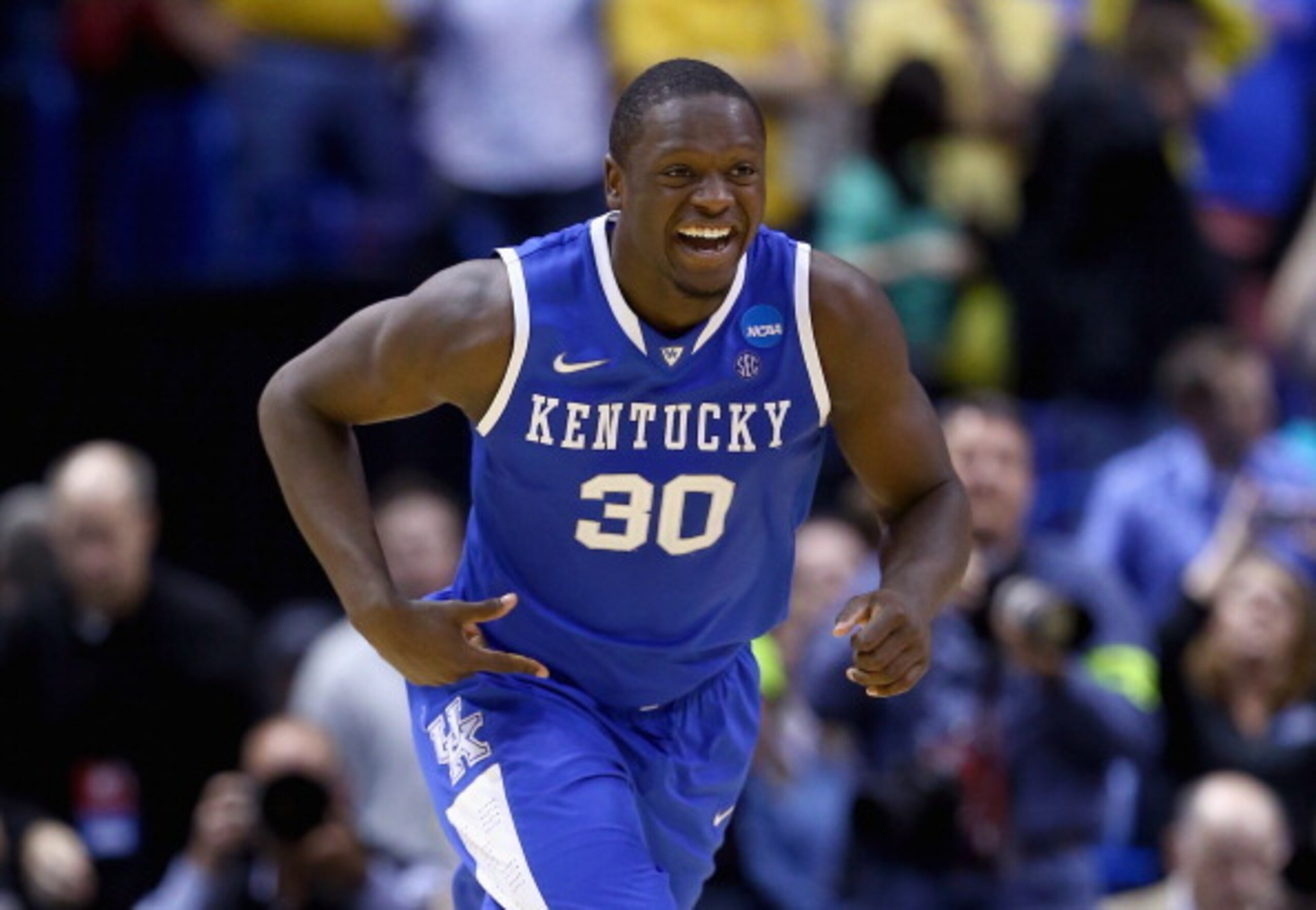 ST LOUIS, MO - MARCH 23: Julius Randle #30 of the Kentucky Wildcats celebrates after defeating the Wichita State Shockers 78 to 76 during the third round of the 2014 NCAA Men's Basketball Tournament at Scottrade Center on March 23, 2014 in St Louis, Miss ST LOUIS, MO - MARCH 23: Julius Randle #30 of the Kentucky Wildcats celebrates after defeating the Wichita State Shockers 78 to 76 during the third round of the 2014 NCAA Men's Basketball Tournament at Scottrade Center on March 23, 2014 in St Louis, Miss