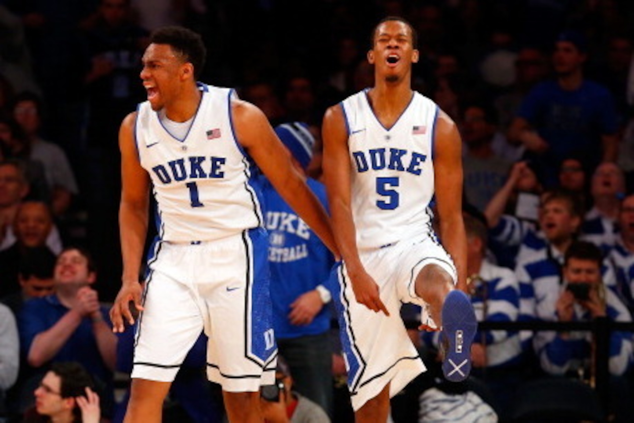 NEW YORK, NY - DECEMBER 19: Rodney Hood #5 of the Duke Blue Devils reacts with teammate Jabari Parker #1 after his basket was disallowed in the second half against the UCLA Bruins during the CARQUEST Auto Parts Classic on December 19, 2013 at Madison Squ NEW YORK, NY - DECEMBER 19: Rodney Hood #5 of the Duke Blue Devils reacts with teammate Jabari Parker #1 after his basket was disallowed in the second half against the UCLA Bruins during the CARQUEST Auto Parts Classic on December 19, 2013 at Madison Squ