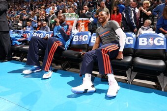 OKLAHOMA CITY, OK - FEBRUARY 20: Russell Westbrook #0 and Kevin Durant #35 of the Oklahoma City Thunder smile before a game against the Miami Heat at Chesapeake Energy Arena on February 20, 2014 in Oklahoma City, Oklahoma. NOTE TO USER: User expressly ack