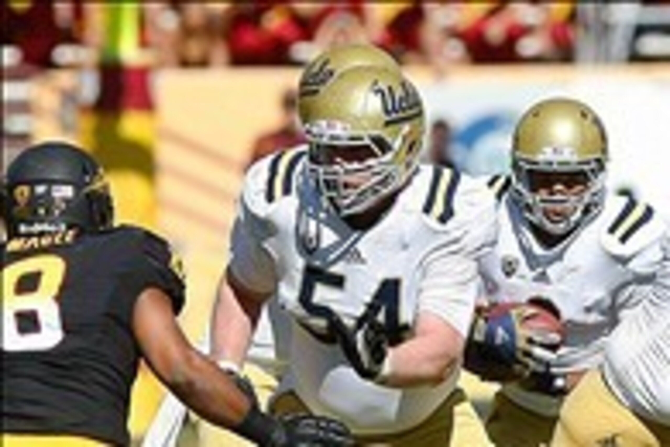 October 27, 2012; Tempe, AZ, USA; UCLA Bruins center Jake Brendel (54) against the Arizona State Sun Devils at Sun Devil Stadium.  Mandatory Credit: Rick Scuteri-USA TODAY Sports