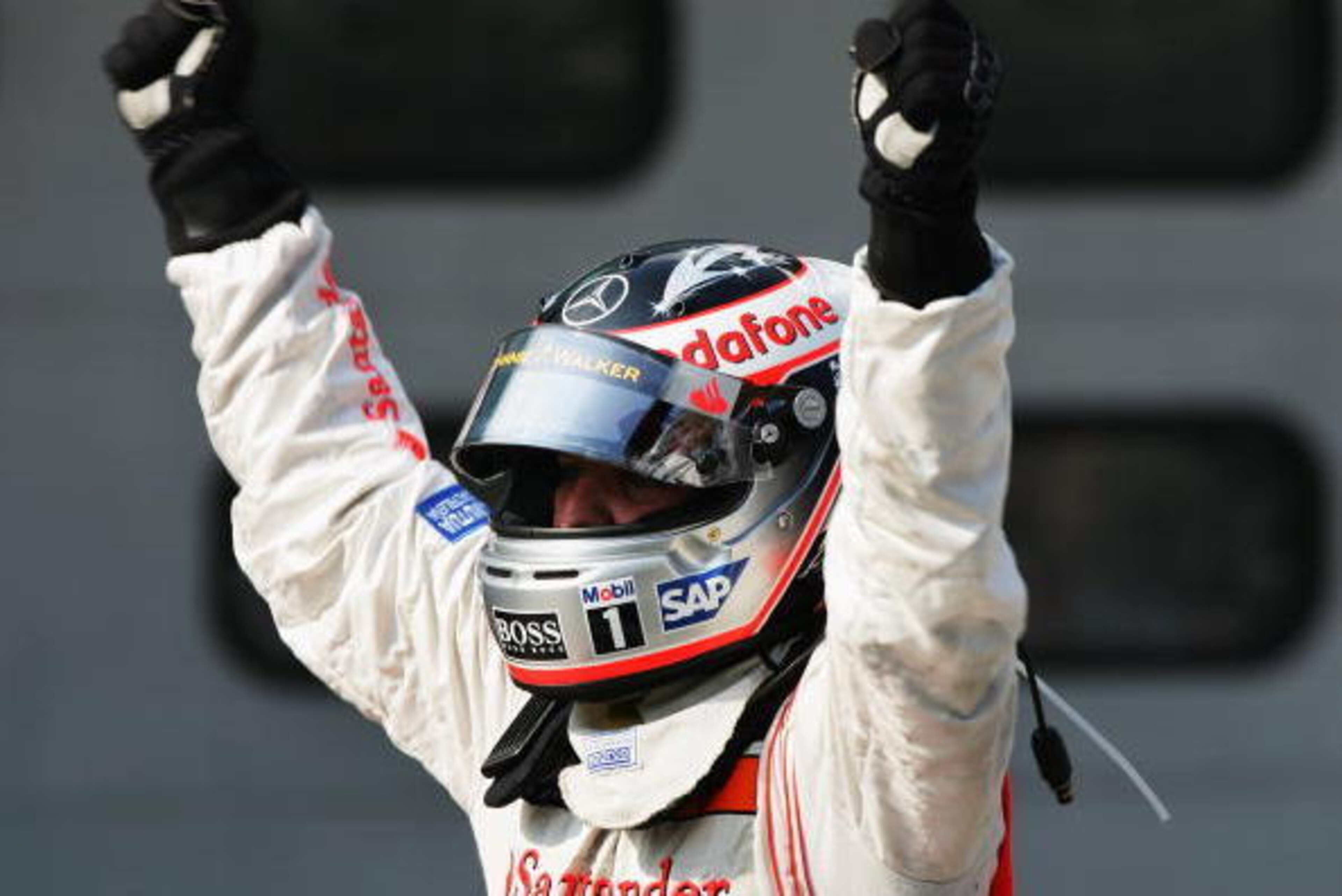 KUALA LUMPUR, MALAYSIA - APRIL 08:  Fernando Alonso of Spain and McLaren Mercedes celebrates winning the Malaysian Formula One Grand Prix at the Sepang Circuit on April 8, 2007, in Kuala Lumpur, Malaysia.  (Photo by Bryn Lennon/Getty Images)