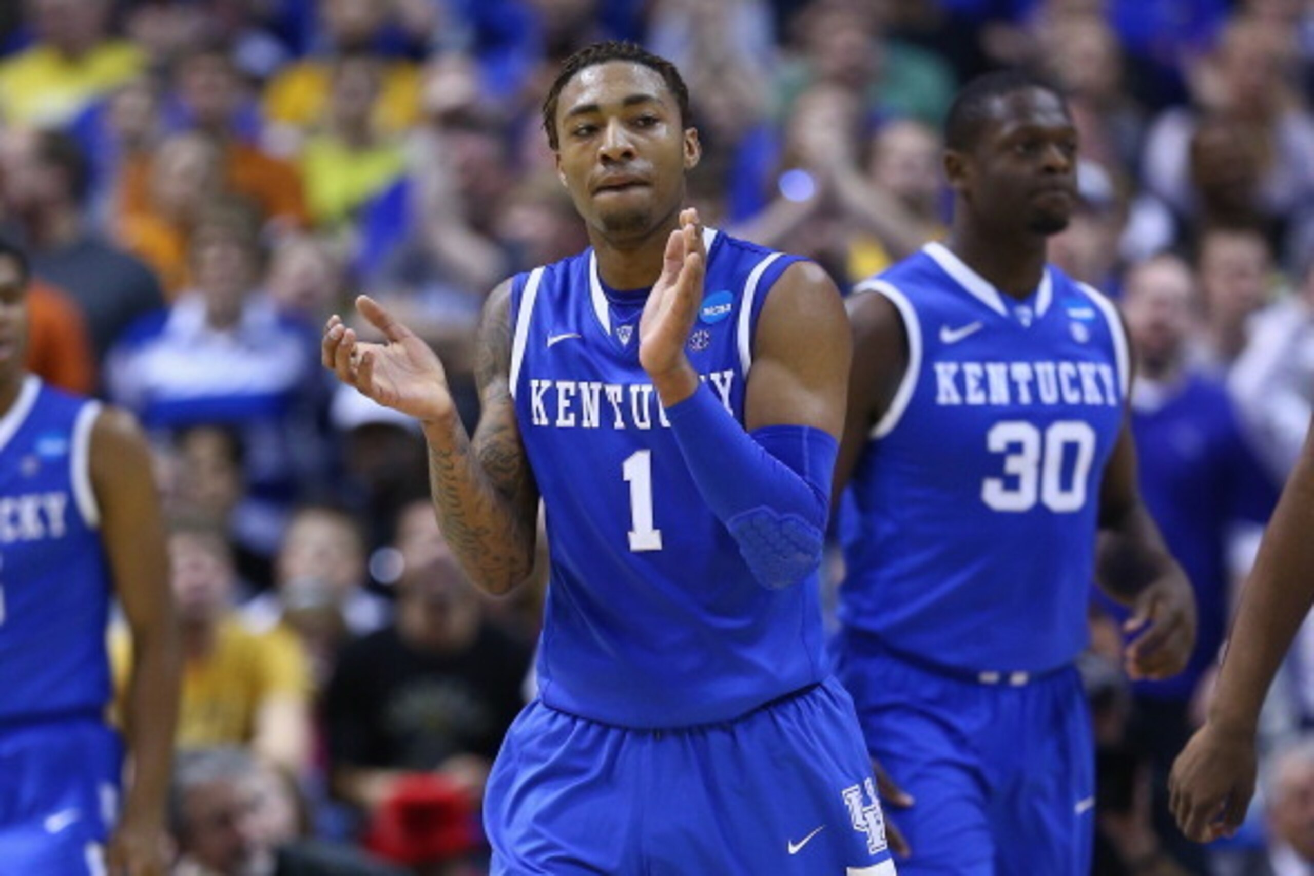 ST LOUIS, MO - MARCH 23:   James Young #1 of the Kentucky Wildcats reacts after a play against the Wichita State Shockers during the third round of the 2014 NCAA Men's Basketball Tournament at Scottrade Center on March 23, 2014 in St Louis, Missouri.  (Ph