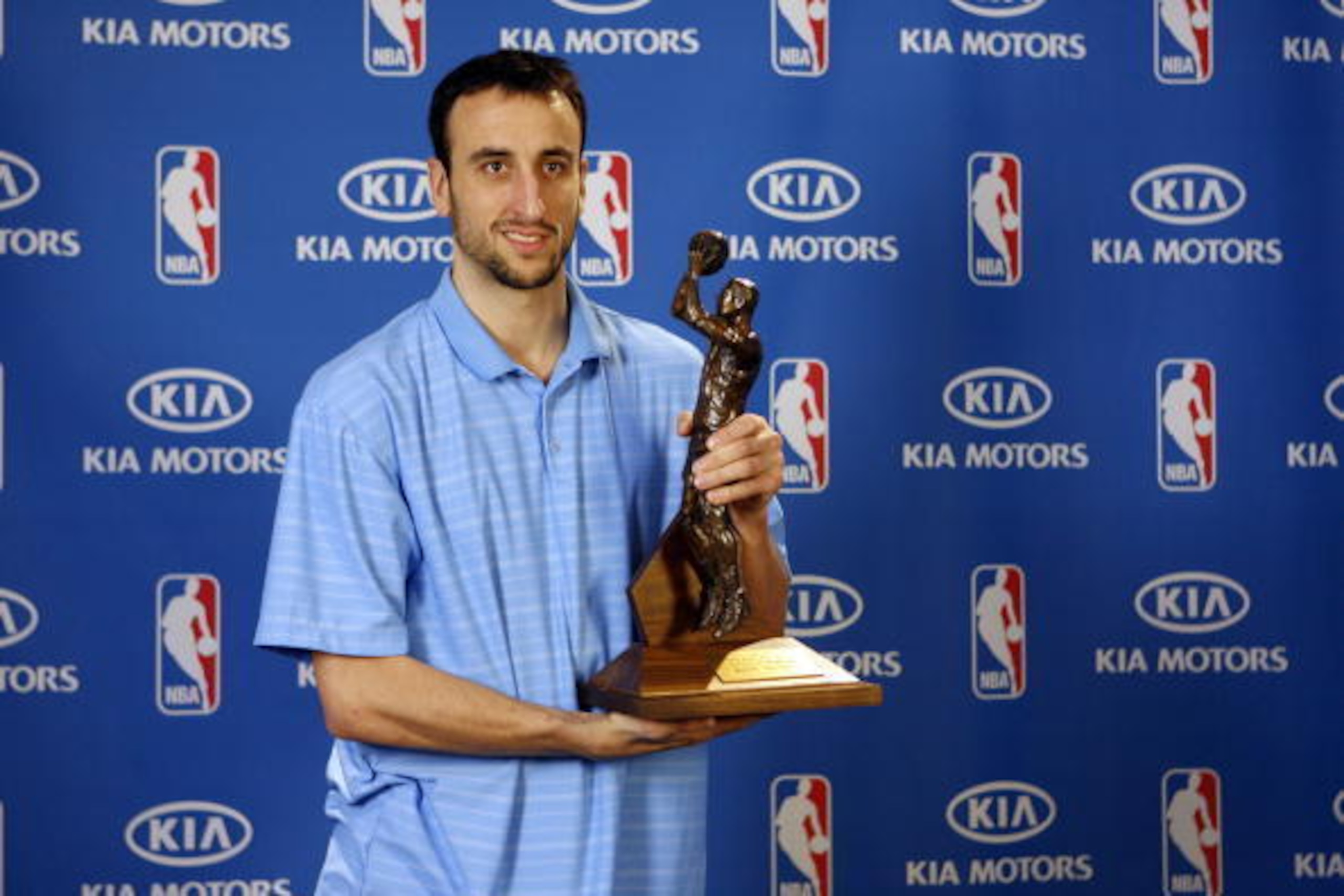 SAN ANTONIO, TX - APRIL 21: Manu Ginobili of the San Antonio Spurs poses with the Sixth Man Award during a press conference announcing the NBA Sixth Man Award presented by KIA Motors on April 21, 2008 at the Spurs Practice Facility in San Antonio, Texas. 