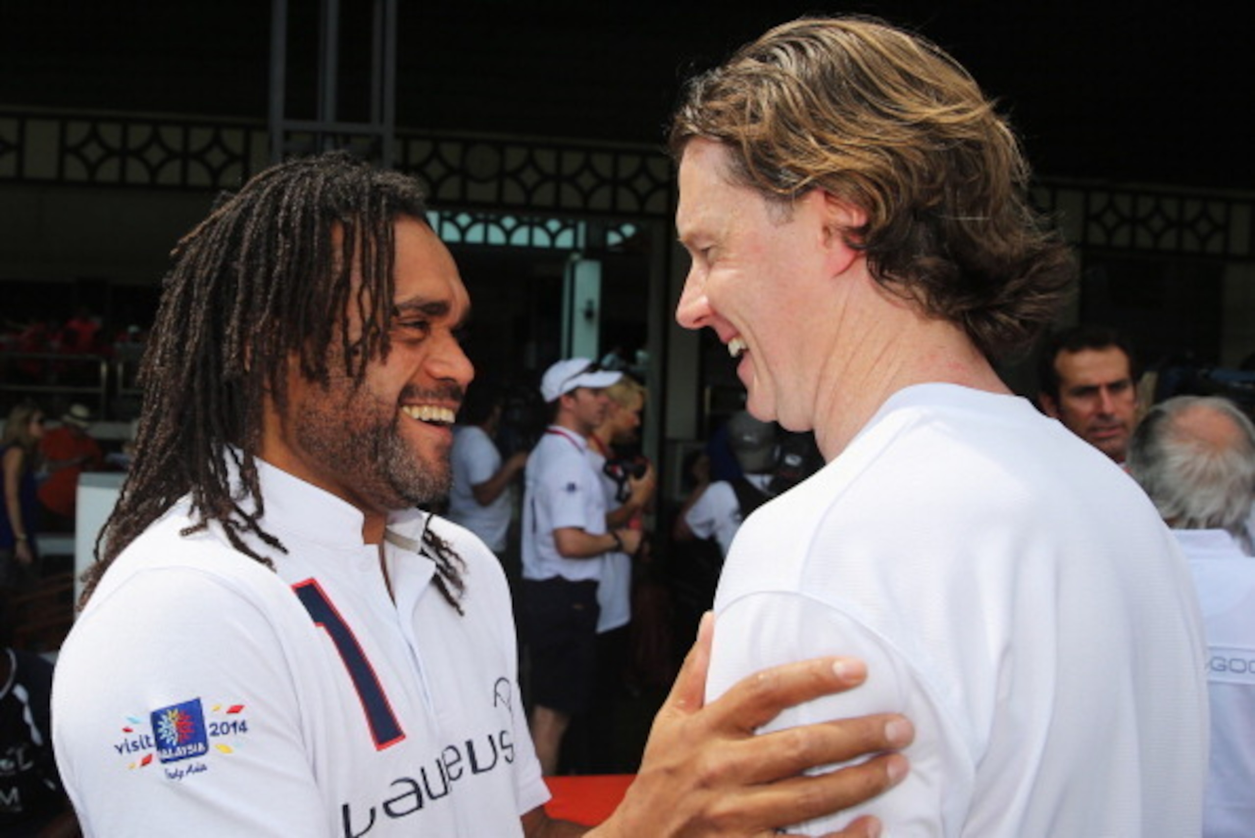 KUALA LUMPUR, MALAYSIA - MARCH 25:  Christian Karembeu and Steve McManaman in discussion during the Laureus All Stars Unity Cup ahead of the 2014 Laureus World Sports Awards at Royal Selangor Club on March 25, 2014 in Kuala Lumpur, Malaysia.  (Photo by Ia