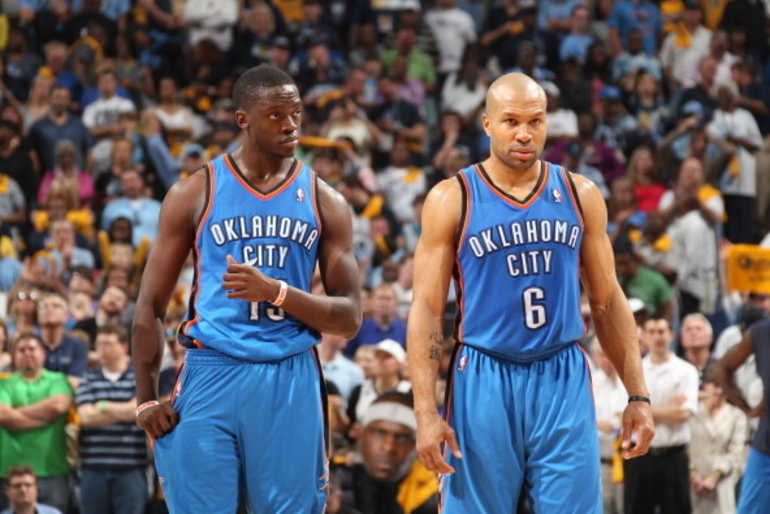 MEMPHIS, TN - MAY 11: Reggie Jackson #15 and Derek Fisher #6 of the Oklahoma City Thunder look on in Game Three of the Western Conference Semifinals against the Memphis Grizzlies during the 2013 NBA Playoffs on May 11, 2013 at FedExForum in Memphis, Tenne