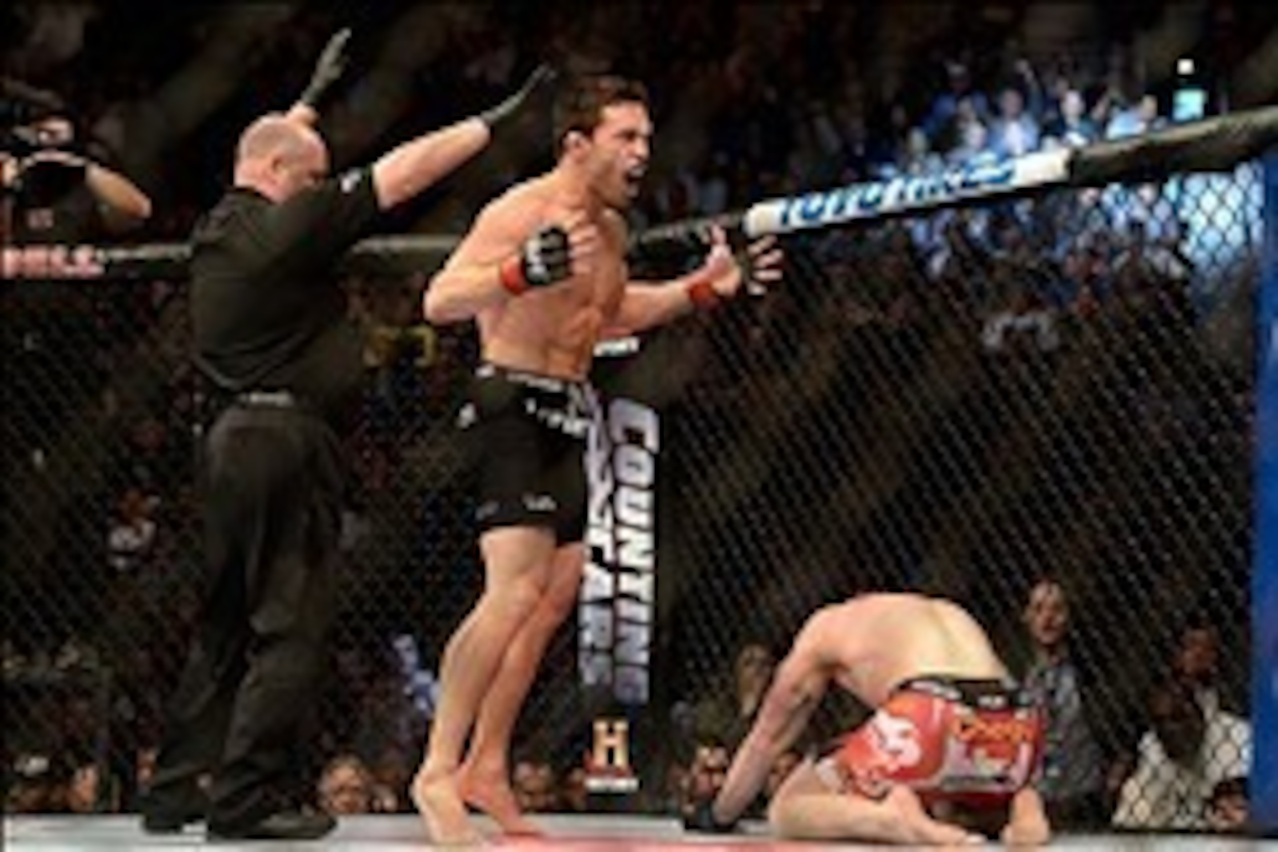 Mar 16, 2013; Montreal, Quebec, CAN; Jake Ellenberger (red) celebrates after defeating Nate Marquardt (blue) in their main card bout at UFC 158 at the Bell Centre. Mandatory Credit: Eric Bolte-USA TODAY Sports Mar 16, 2013; Montreal, Quebec, CAN; Jake Ellenberger (red) celebrates after defeating Nate Marquardt (blue) in their main card bout at UFC 158 at the Bell Centre. Mandatory Credit: Eric Bolte-USA TODAY Sports