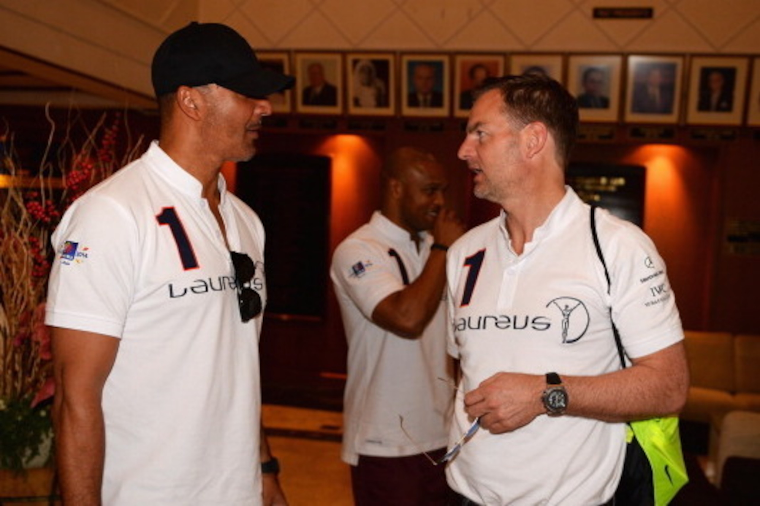 KUALA LUMPUR, MALAYSIA - MARCH 25:  Ruud Gullit and Ronald de Boer (R) in discussion during the Laureus All Stars Unity Cup ahead of the 2014 Laureus World Sports Awards at Royal Selangor Club on March 25, 2014 in Kuala Lumpur, Malaysia.  (Photo by Mike H