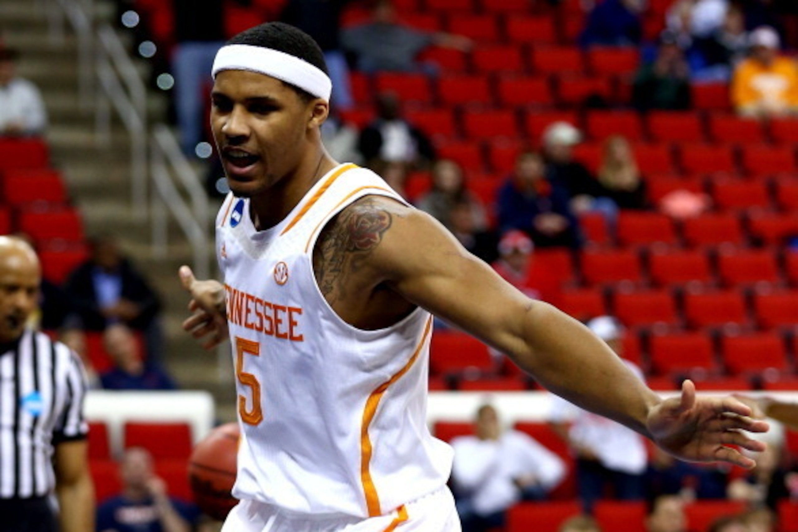 RALEIGH, NC - MARCH 23: Jarnell Stokes #5 of the Tennessee Volunteers reacts after a basket in the first half against the Mercer Bears during the third round of the 2014 NCAA Men's Basketball Tournament at PNC Arena on March 23, 2014 in Raleigh, North Car RALEIGH, NC - MARCH 23: Jarnell Stokes #5 of the Tennessee Volunteers reacts after a basket in the first half against the Mercer Bears during the third round of the 2014 NCAA Men's Basketball Tournament at PNC Arena on March 23, 2014 in Raleigh, North Car