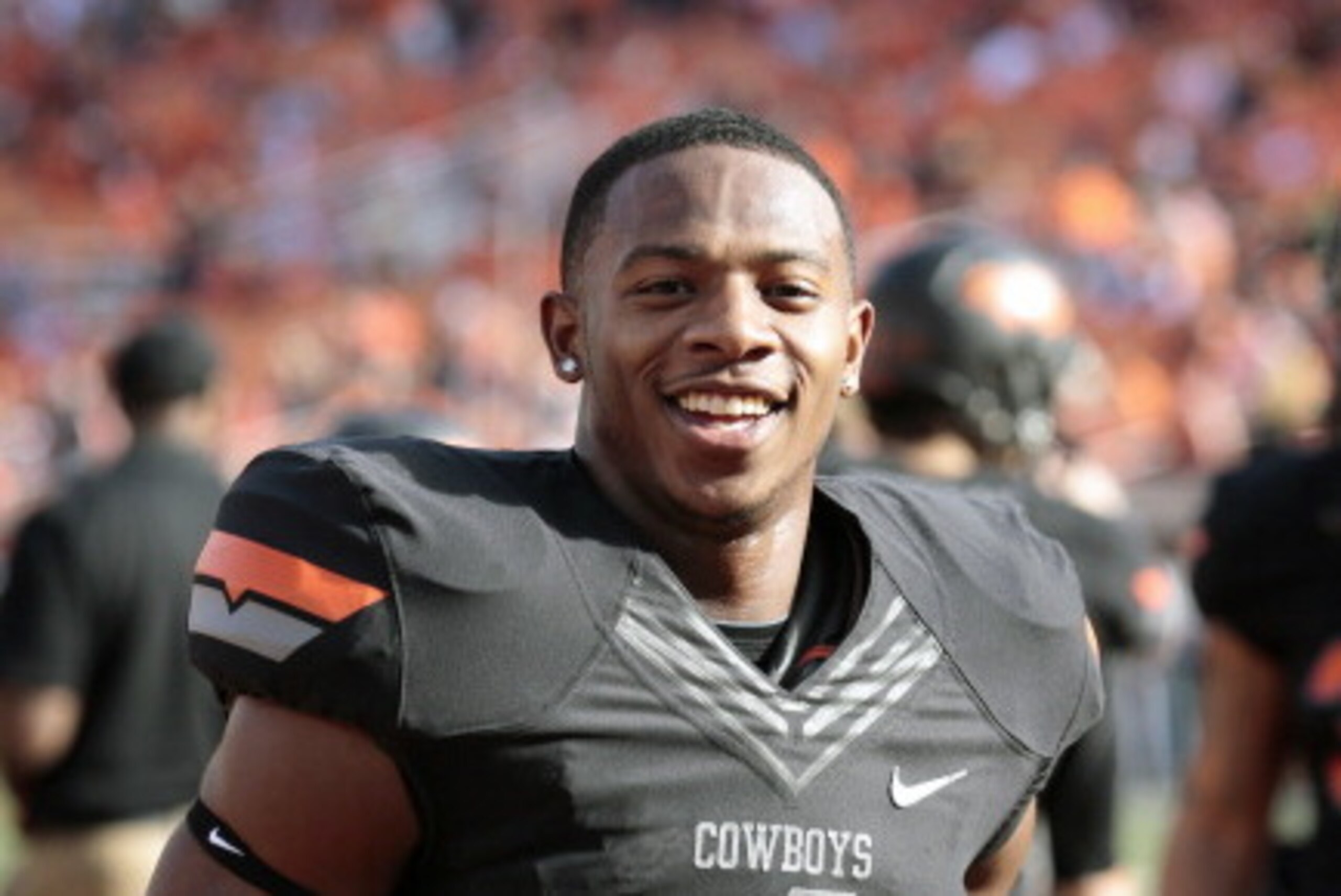 STILLWATER, OK - NOVEMBER 09:  Cornerback Justin Gilbert #4 of the Oklahoma State Cowboys smiles before the game against the Kansas Jayhawks November 9, 2013 at Boone Pickens Stadium in Stillwater, Oklahoma. The Cowboys defeated the Jayhawks 42-6. (Photo 