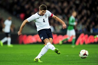 LONDON, ENGLAND - NOVEMBER 19:  Steven Gerrard of England takes a shot on goal during the international friendly match between England and Germany at Wembley Stadium on November 19, 2013 in London, England.  (Photo by Shaun Botterill/Getty Images)