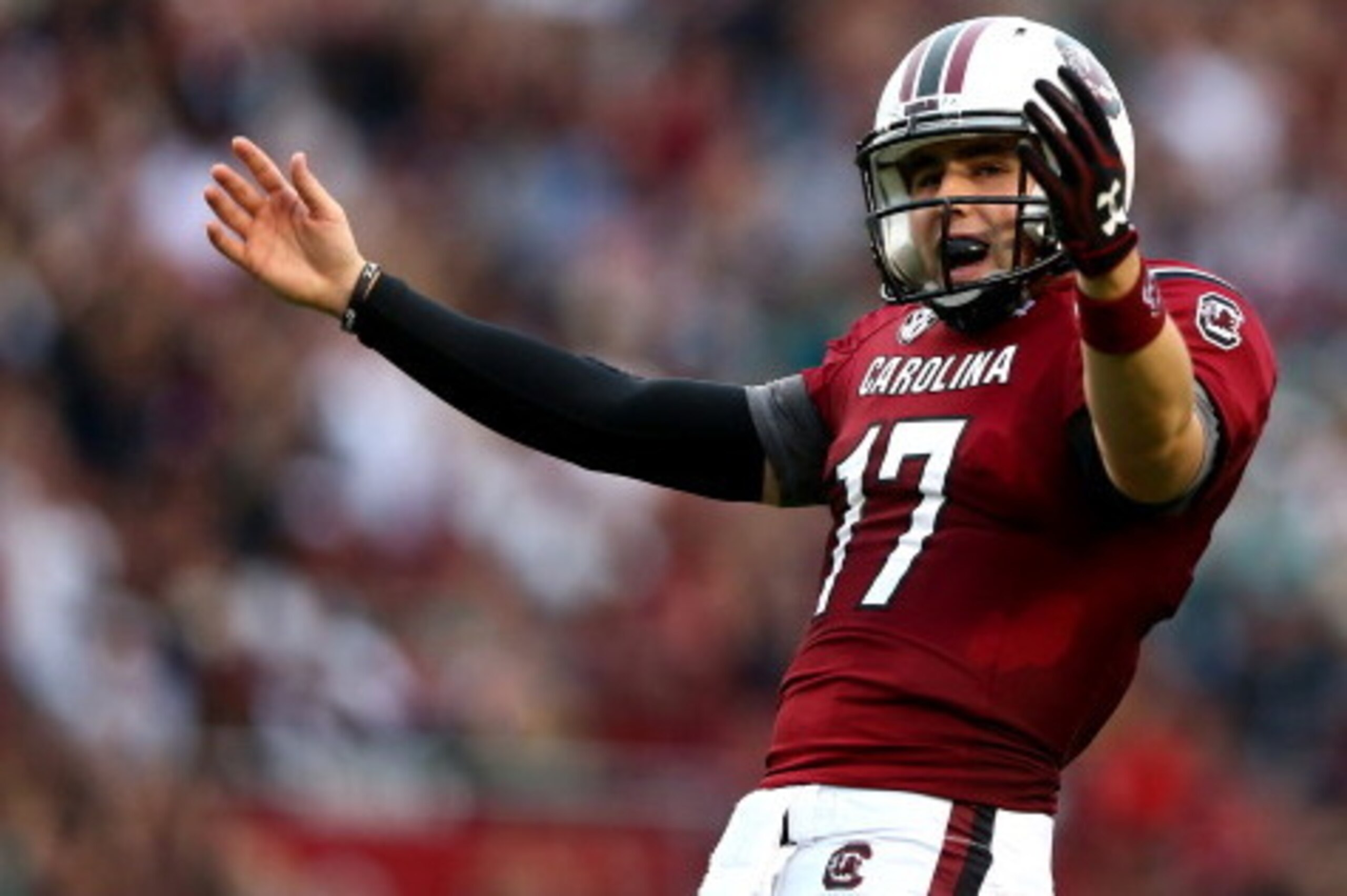 COLUMBIA, SC - NOVEMBER 23:  Dylan Thompson #17 of the South Carolina Gamecocks celebrates after a touchdown during their game against the Coastal Carolina Chanticleers at Williams-Brice Stadium on November 23, 2013 in Columbia, South Carolina.  (Photo by