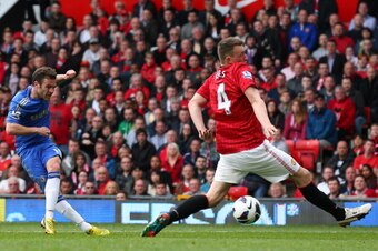 MANCHESTER, ENGLAND - MAY 05:  Juan Mata of Chelsea scores the winning goal during the Barclays Premier League match between Manchester United and Chelsea at Old Trafford on May 5, 2013 in Manchester, England.  (Photo by Alex Livesey/Getty Images)