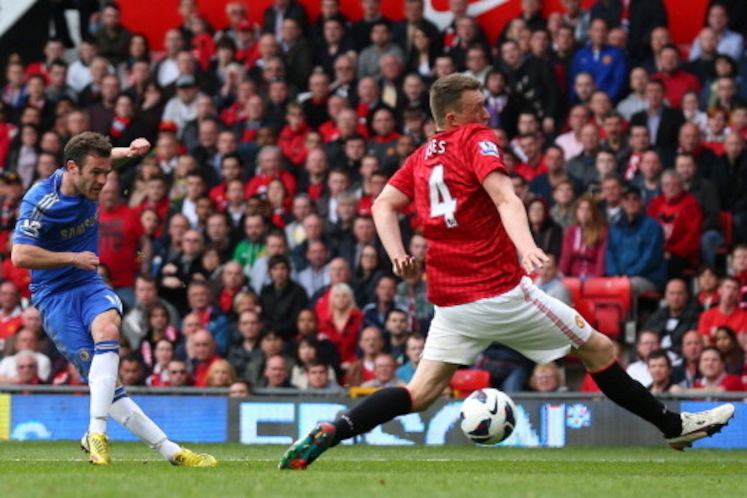 MANCHESTER, ENGLAND - MAY 05: Juan Mata of Chelsea scores the winning goal during the Barclays Premier League match between Manchester United and Chelsea at Old Trafford on May 5, 2013 in Manchester, England. (Photo by Alex Livesey/Getty Images) MANCHESTER, ENGLAND - MAY 05: Juan Mata of Chelsea scores the winning goal during the Barclays Premier League match between Manchester United and Chelsea at Old Trafford on May 5, 2013 in Manchester, England. (Photo by Alex Livesey/Getty Images)