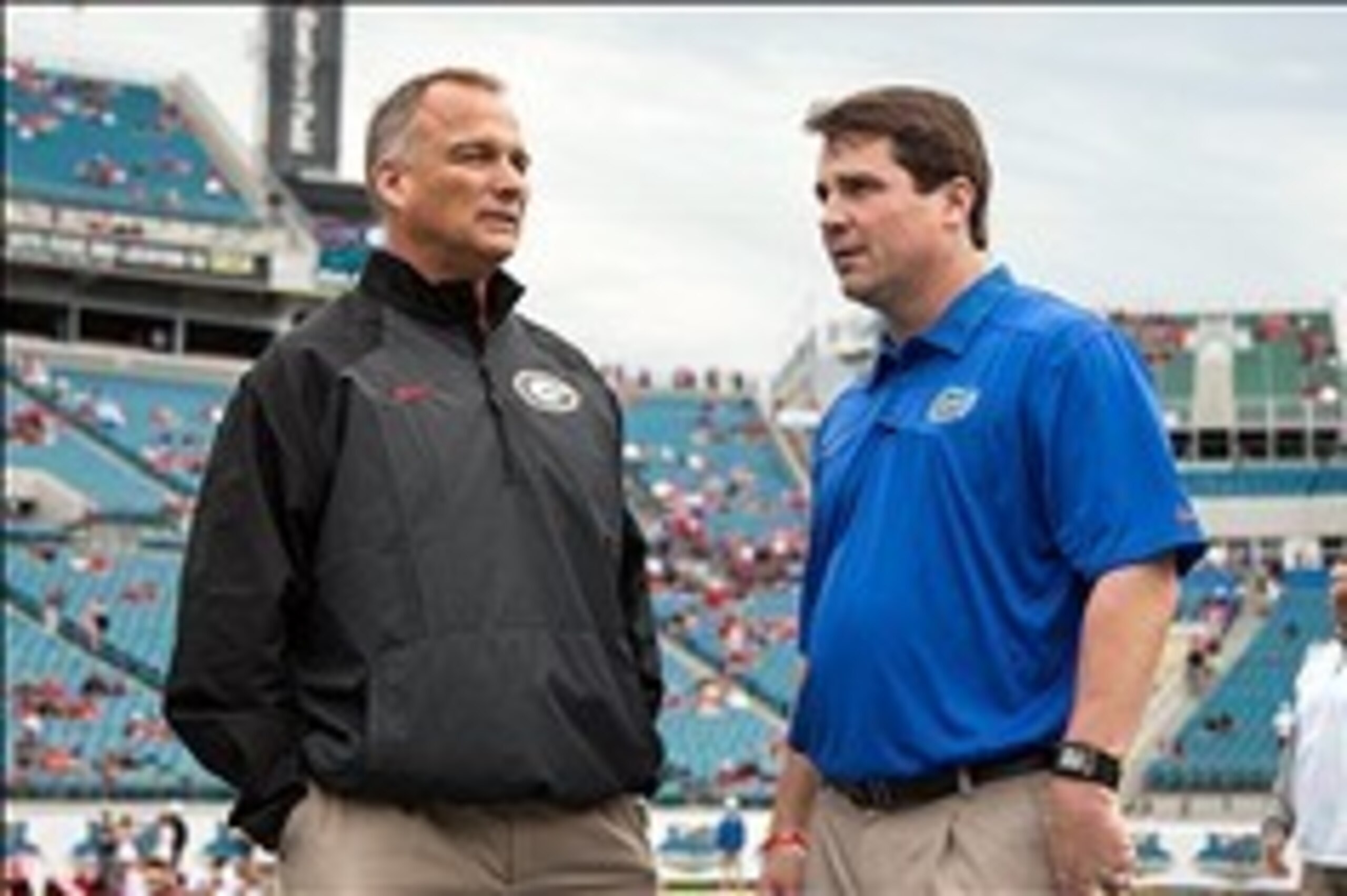 Nov 2, 2013; Jacksonville, FL, USA; Georgia Bulldogs head coach Mark Richt and Florida Gators head coach Will Muschamp before the game at EverBank Field. Mandatory Credit: Rob Foldy-USA TODAY Sports Nov 2, 2013; Jacksonville, FL, USA; Georgia Bulldogs head coach Mark Richt and Florida Gators head coach Will Muschamp before the game at EverBank Field. Mandatory Credit: Rob Foldy-USA TODAY Sports