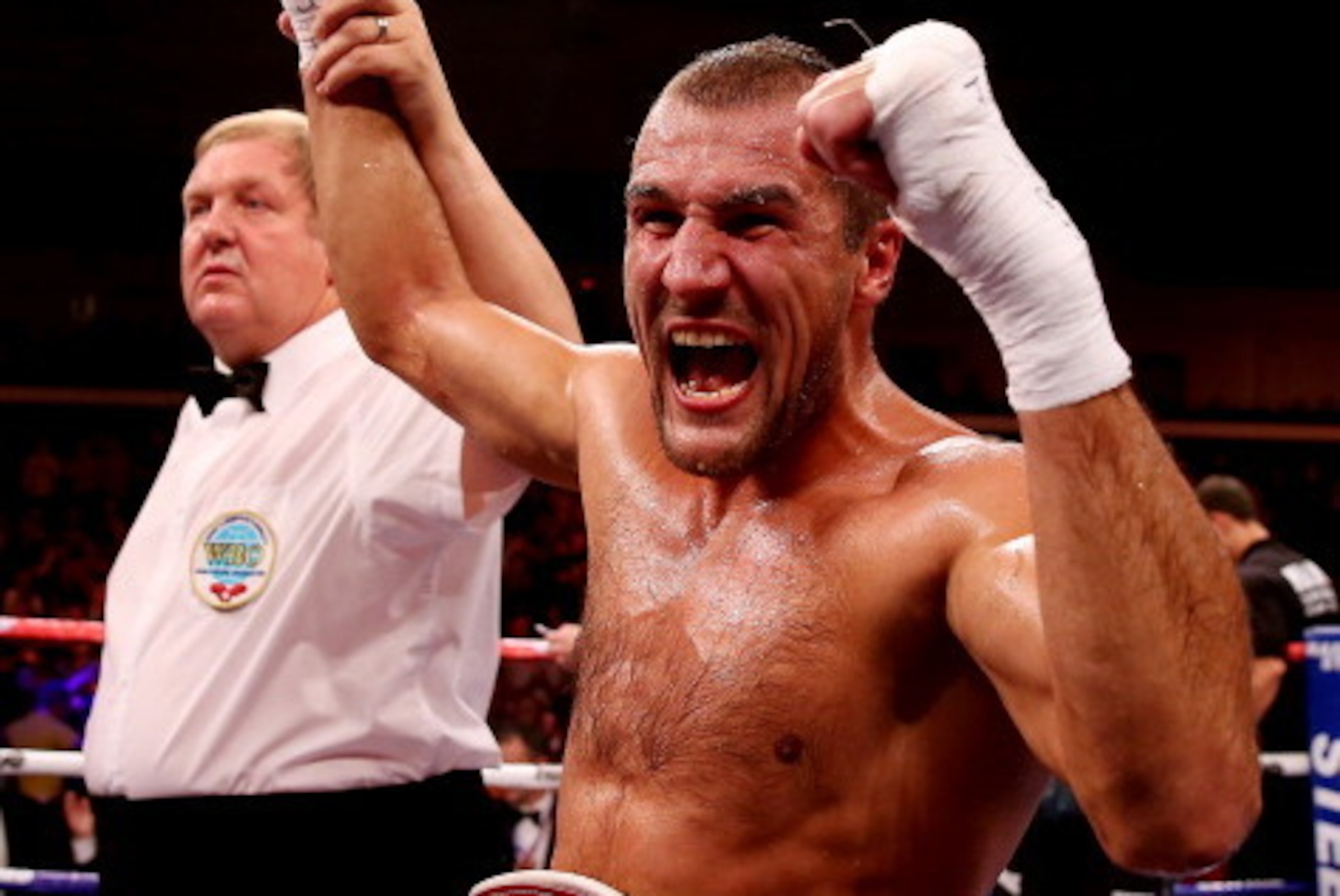 CARDIFF, WALES - AUGUST 17:  Sergey Kovalev celebrates his victory over Nathan Cleverly during the WBO World Light-Heavyweight Championship bout at Motorpoint Arena on August 17, 2013 in Cardiff, Wales.  (Photo by Scott Heavey/Getty Images)