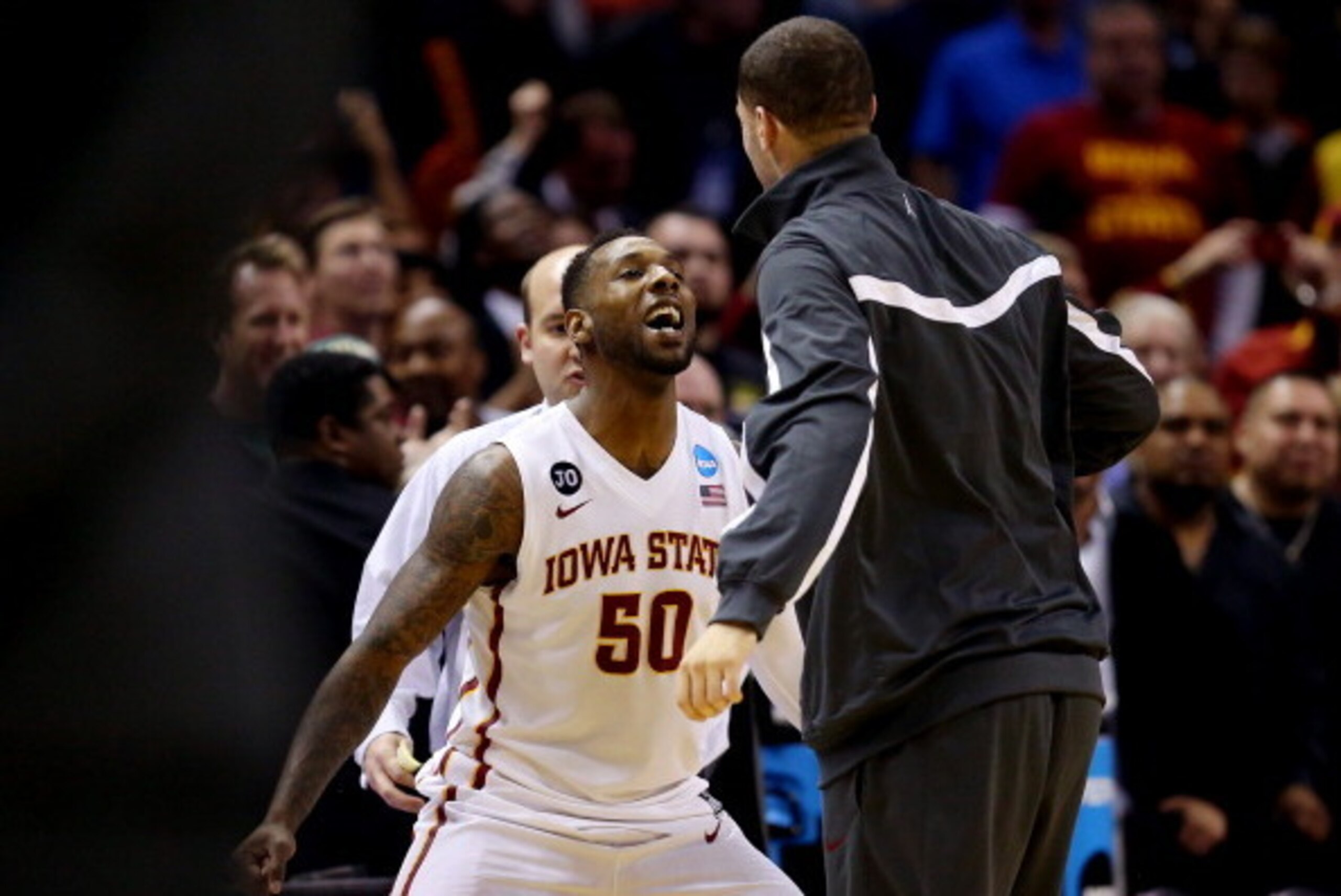 SAN ANTONIO, TX - MARCH 23: DeAndre Kane #50 celebrates with Georges Niang #31 of the Iowa State Cyclones after defeating the North Carolina Tar Heels 85-83 in the third round of the 2014 NCAA Men's Basketball Tournament at the AT&T Center on March 23, 20