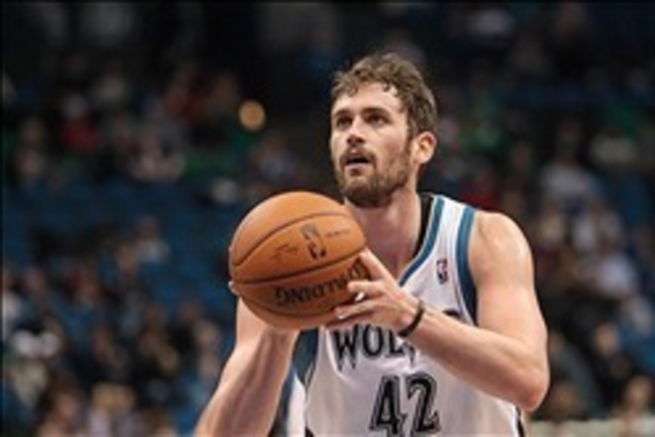 Feb 4, 2014; Minneapolis, MN, USA; Minnesota Timberwolves power forward Kevin Love (42) shoots against the Los Angeles Lakers at Target Center. Mandatory Credit: Brad Rempel-USA TODAY Sports