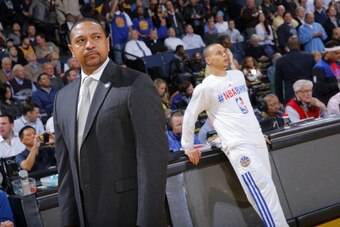 OAKLAND, CA - FEBRUARY 10: Head Coach Mark Jackson of the Golden State Warriors coaches against the Philadelphia 76ers on February 10, 2014 at Oracle Arena in Oakland, California. NOTE TO USER: User expressly acknowledges and agrees that, by downloading a