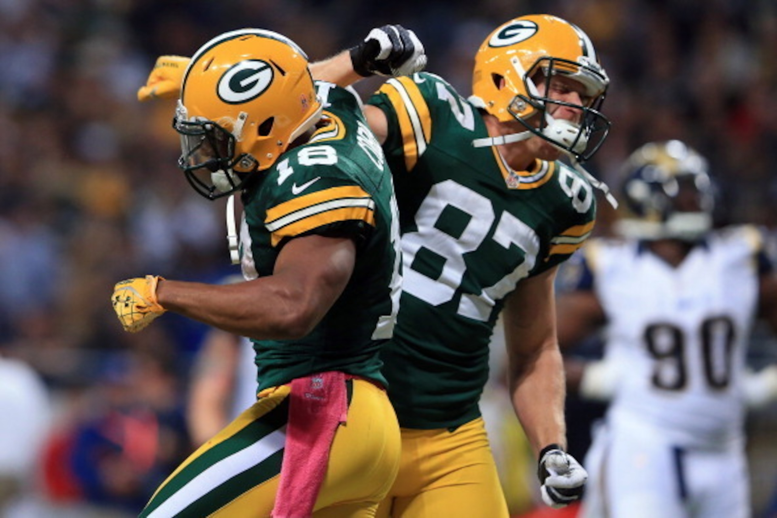 ST LOUIS, MO - OCTOBER 21:  Wide receiver Randall Cobb #18 of the Green Bay Packers celebrates his 39 yard touchdown reception against the St. Louis Rams with wide receiver Jordy Nelson #87 of the Green Bay Packers in the fourth quarter at Edward Jones Do
