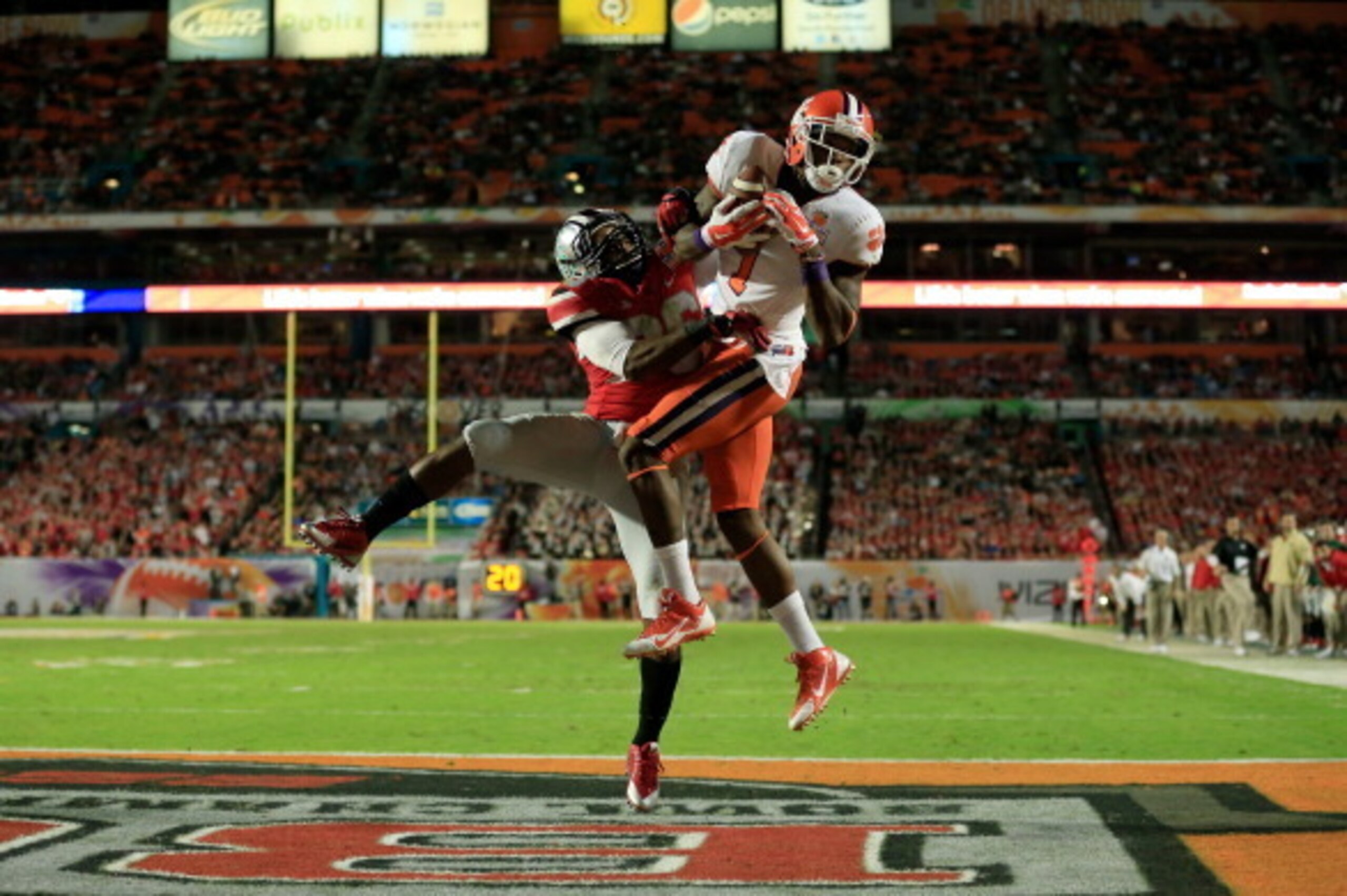 MIAMI GARDENS, FL - JANUARY 03:  Martavis Bryant #1 of the Clemson Tigers catches a touchdown against Armani Reeves #26 of the Ohio State Buckeyes in the second quarter during the Discover Orange Bowl at Sun Life Stadium on January 3, 2014 in Miami Garden