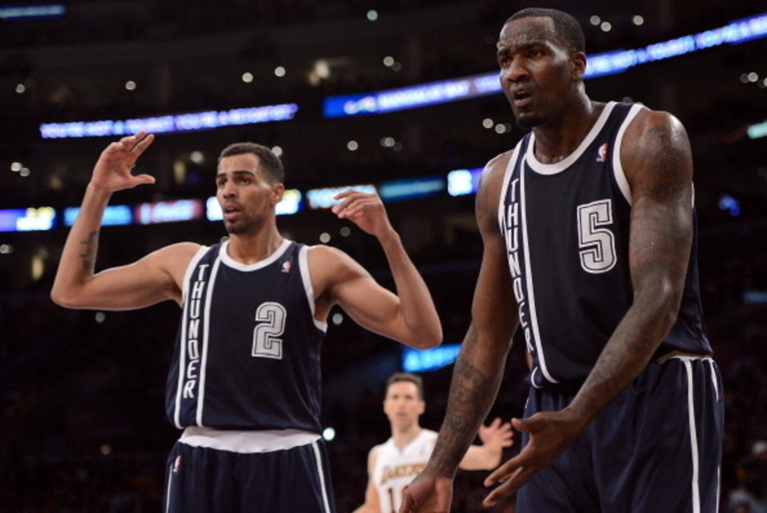 LOS ANGELES, CA - JANUARY 27:  Kendrick Perkins #5 and Thabo Sefolosha #2 of the Oklahoma City Thunder react to a Thunder foul during the game against the Los Angeles Lakers at Staples Center on January 27, 2013 in Los Angeles, California.  NOTE TO USER: 
